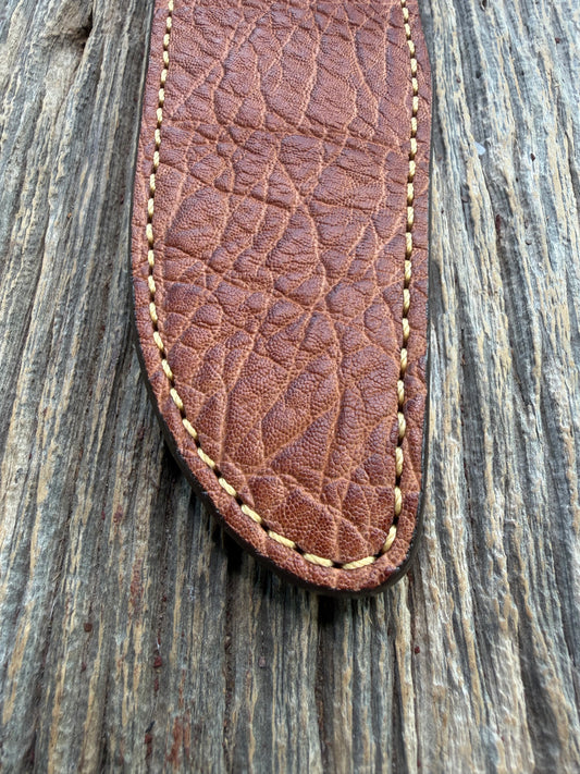 New Randall Model 1-8 Sheath in Exotic thick and textured Rust colored Elephant hide on brown leather from Treeman with a silver Canteen snap. Hand tooled belt loop. Killer sheath.