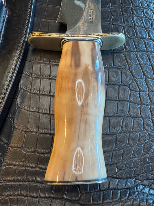 Randall Model 12-11 Dealer Special Large Sasquatch in a Huge piece of Creamy Fossil Walrus Ivory. Gold and Silver Engraved by Jere Davidson. Nickel Silver Hilt and Butt plate.