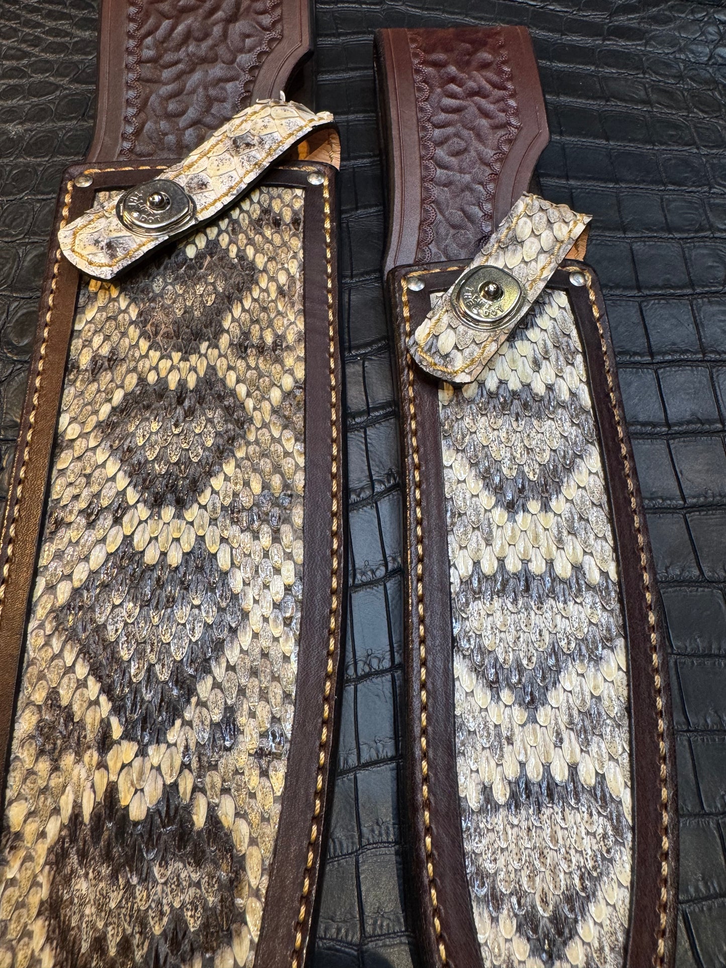 A pair of Randall Model 12-11 Large Sasquatch and Randall Model 12-8 Small Sasquatch Sheaths in Exotic Vibrant Diamond Pattern Rattlesnake skin by Treeman.