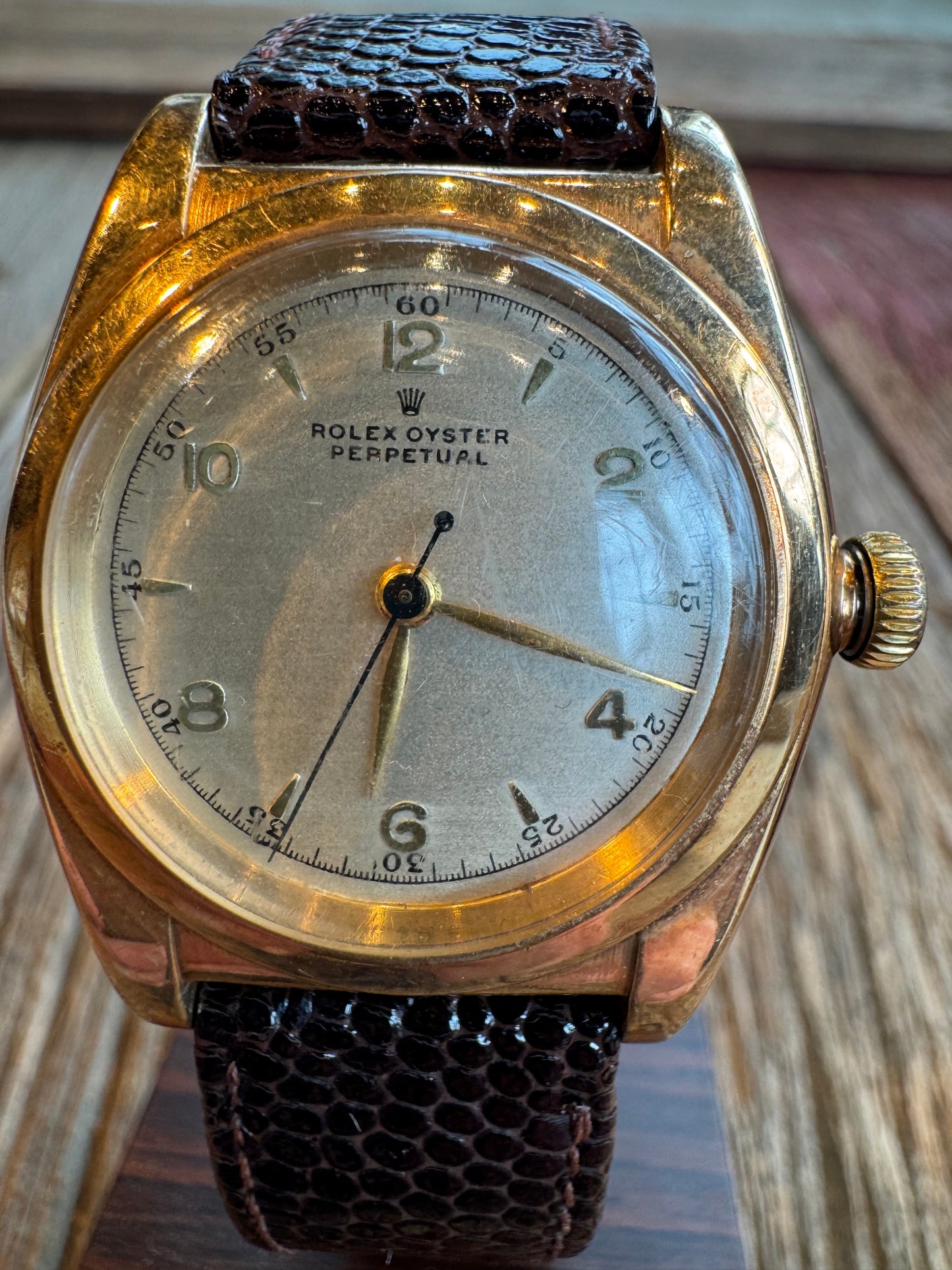 Vintage Rolex Oyster Perpetual Bubble Back circa 1940-1942 Rose Gold case with cream dial. Hirsch Lizard 18mm strap. No box or papers.