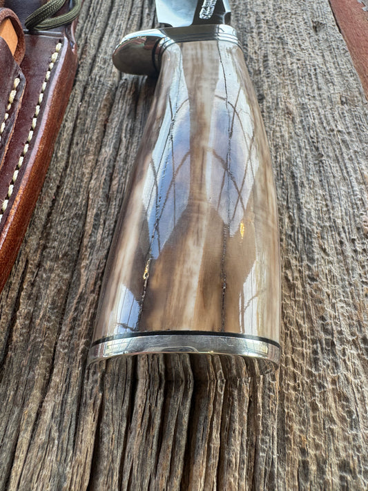 Randall Knife Model 11-4.5 Fossil Walrus Handle, Sterling Sliver Hilt, Spacers and Butt plate. I bought this from Rick Bowles directly. Stainless Steel