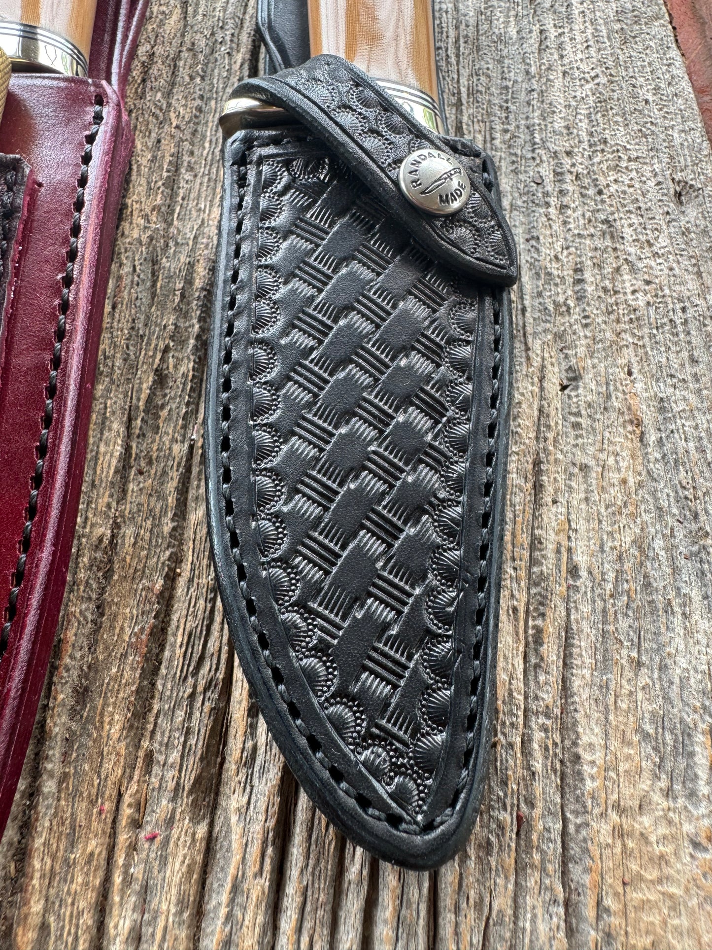 A pair of Randall Stanaback Specials in Bone Linen Micarta. A large and the small Stanaback with a 4 and a 4 1/2” Stainless steel Blade, Nickel Silver Single Hilt with Aluminum & Black Spacers. Nickel silver butt caps and a Lanyard. Special Edition