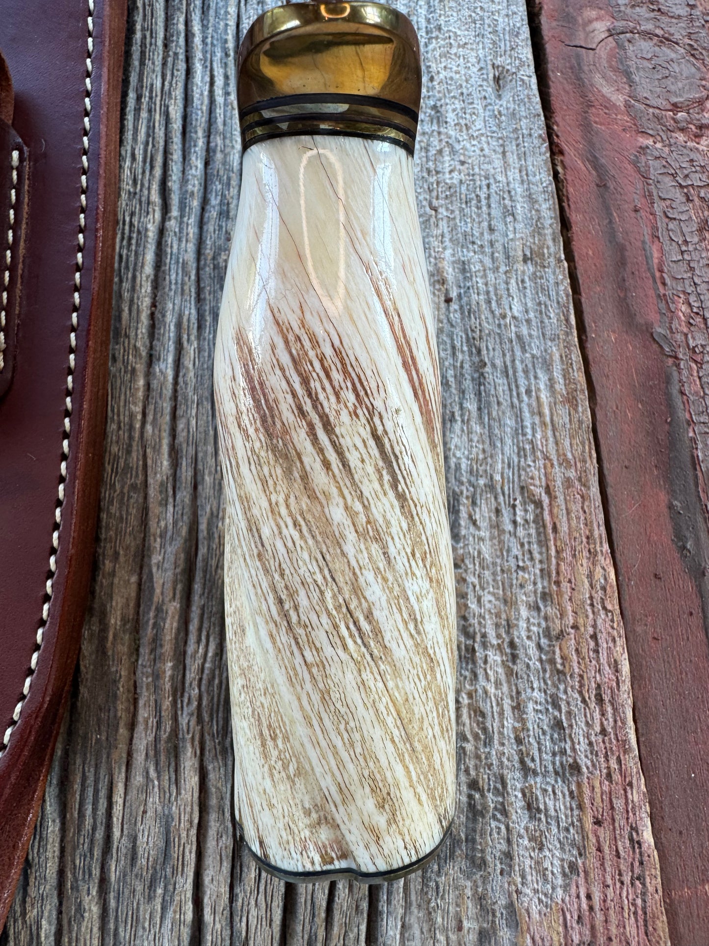 Rare Randall Model 12-9 in Beautiful Spiraled Narwal, Brass hilt and butt plate. Stainless steel, Stunning and rare. Really really fat handle.