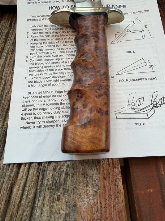 New in Paper Randall Made Knife Model 1-8 in Thuya wood. Stainless, single Black spacer, Sawteeth, Nickel Hilt.