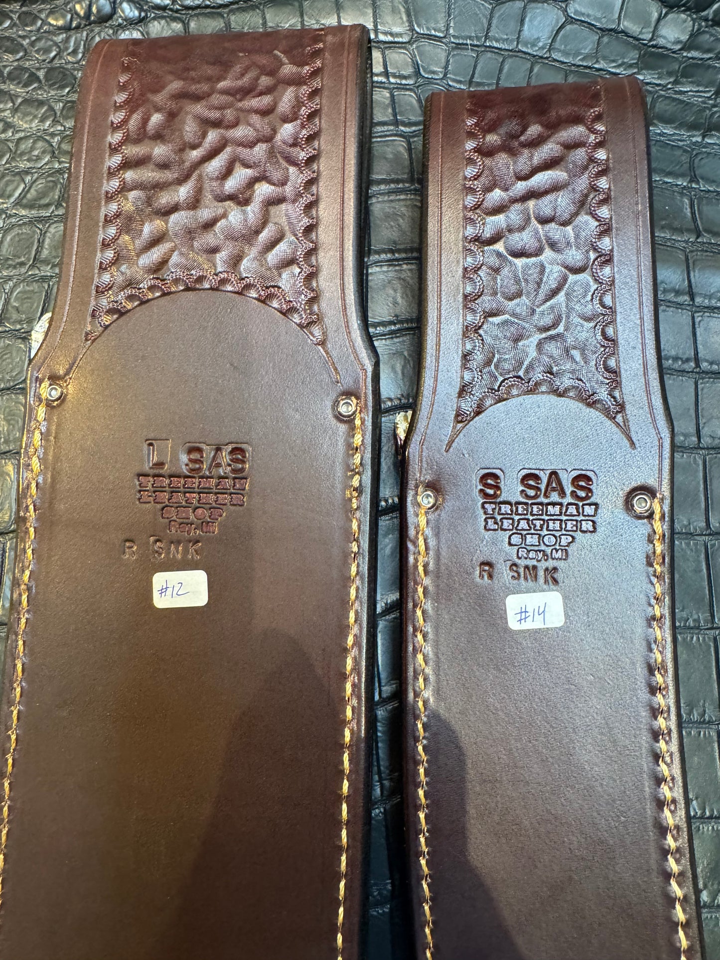 A pair of Randall Model 12-11 Large Sasquatch and Randall Model 12-8 Small Sasquatch Sheaths in Exotic Vibrant Diamond Pattern Rattlesnake skin by Treeman.
