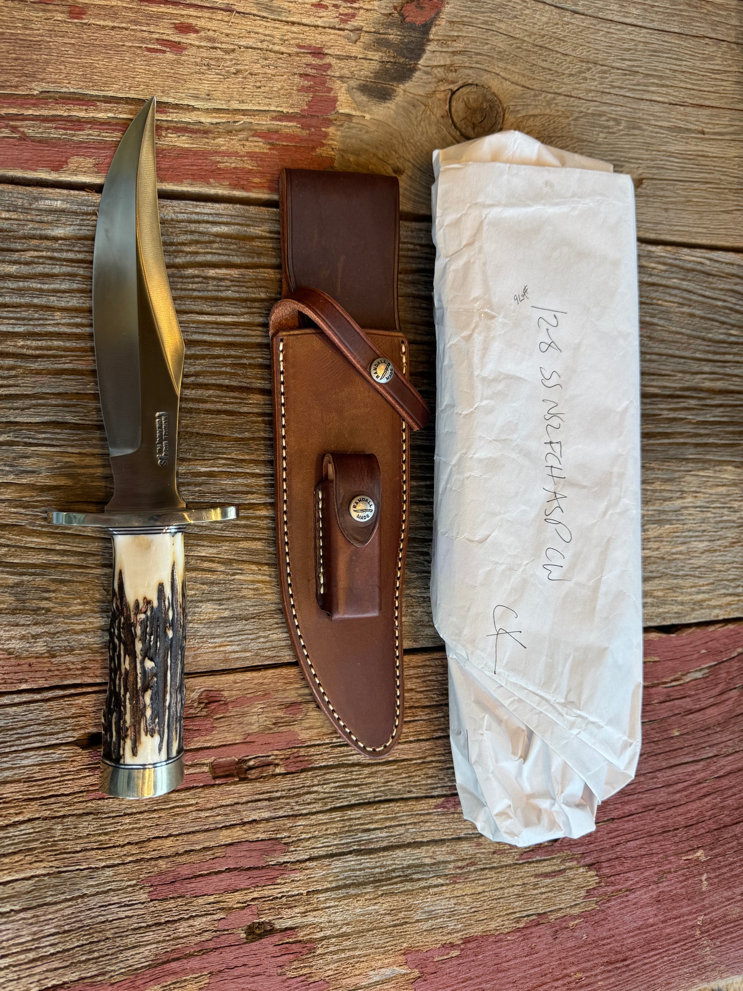 New in paper Randall Knife Model 12-8 “Big Bear” Large piece of Gnarly Popcorn Stag. Nickel silver hilt and butt cap. Stainless steel.