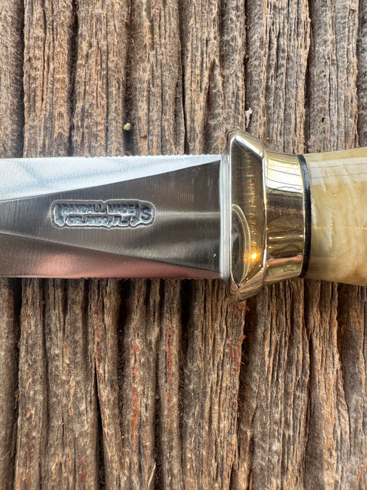 Randall Model Gambler in Musk Ox. Nice piece of Musk Ox with a natural raw end. Nickel Silver collar. Black Crocodile Randall Sheath.
