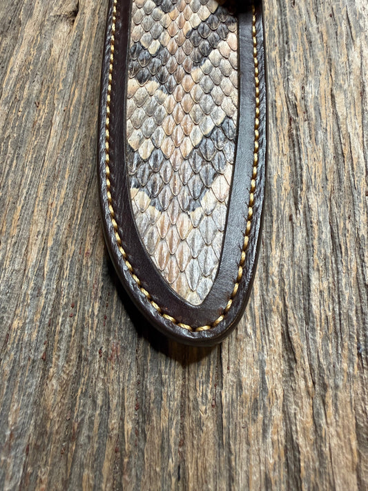 Randall Model 25-6 sheath with a Canebrake RattleSnake skin from Treeman Sheaths. Vibrant colors and along side Copperheads the hardest skin to source.