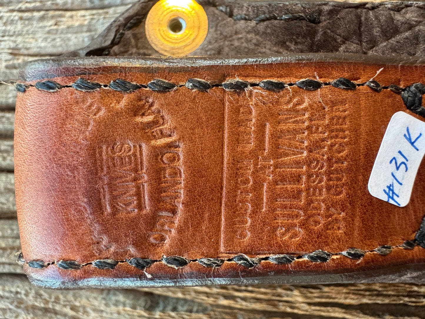 Randall Model 11-4 Sheath in Exotic faded Black Hippo. Snap closure over the hilt , belt loop on the back versus on top. (very rare) Custom Made at Sullivan’s by Gutcher.