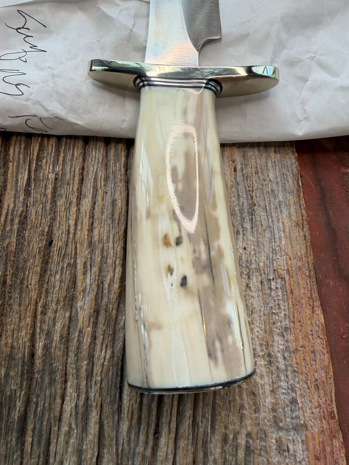 New in Paper Randall Model 12-8 Small Sasquatch with a nice piece of Fossil Walrus Ivory, Nickel Silver Hilt and butt plate.