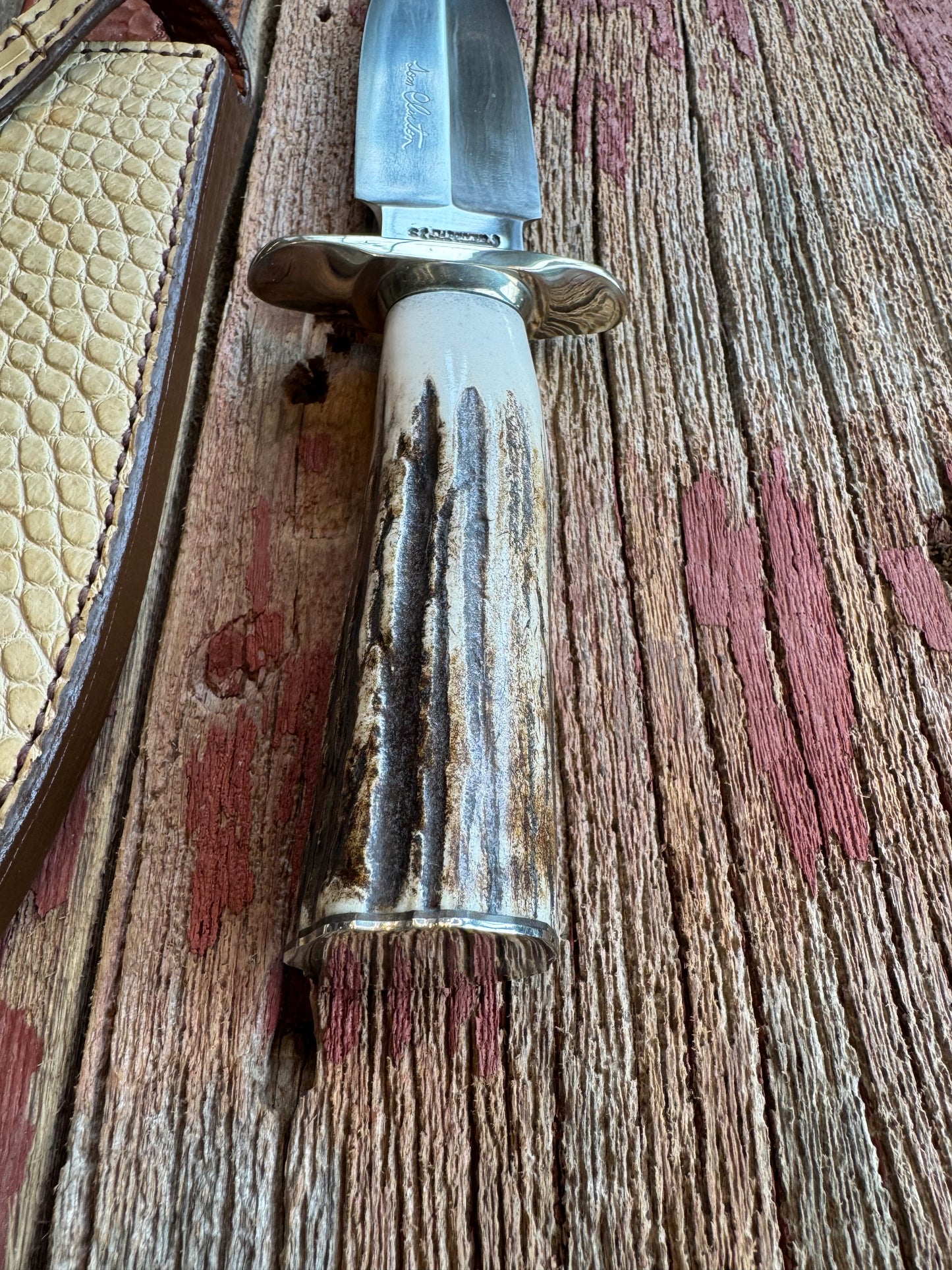 Randall Tom Clinton Dealer Special. Clinton Blade etched Commemorative 1/100 in a nice piece of Stag. Very cool Ostrich Gutcher sheath. Nickel Silver Hilt and Nickel Butt cap. Included in black facsimile Tom Clinton case.