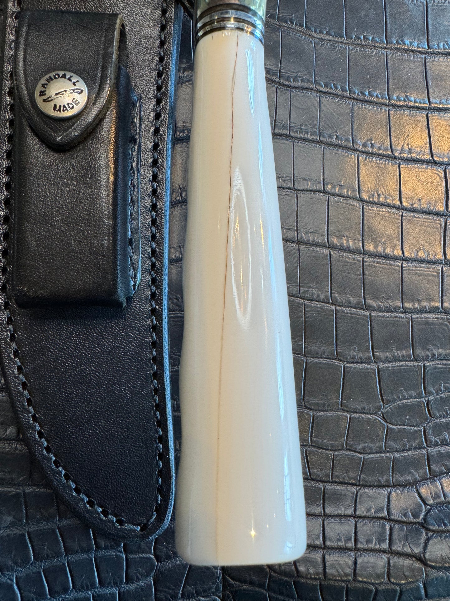 Randall Model 3-7 in Elephant Ivory with finger grooves and a natural end. Nickel Silver Hilt