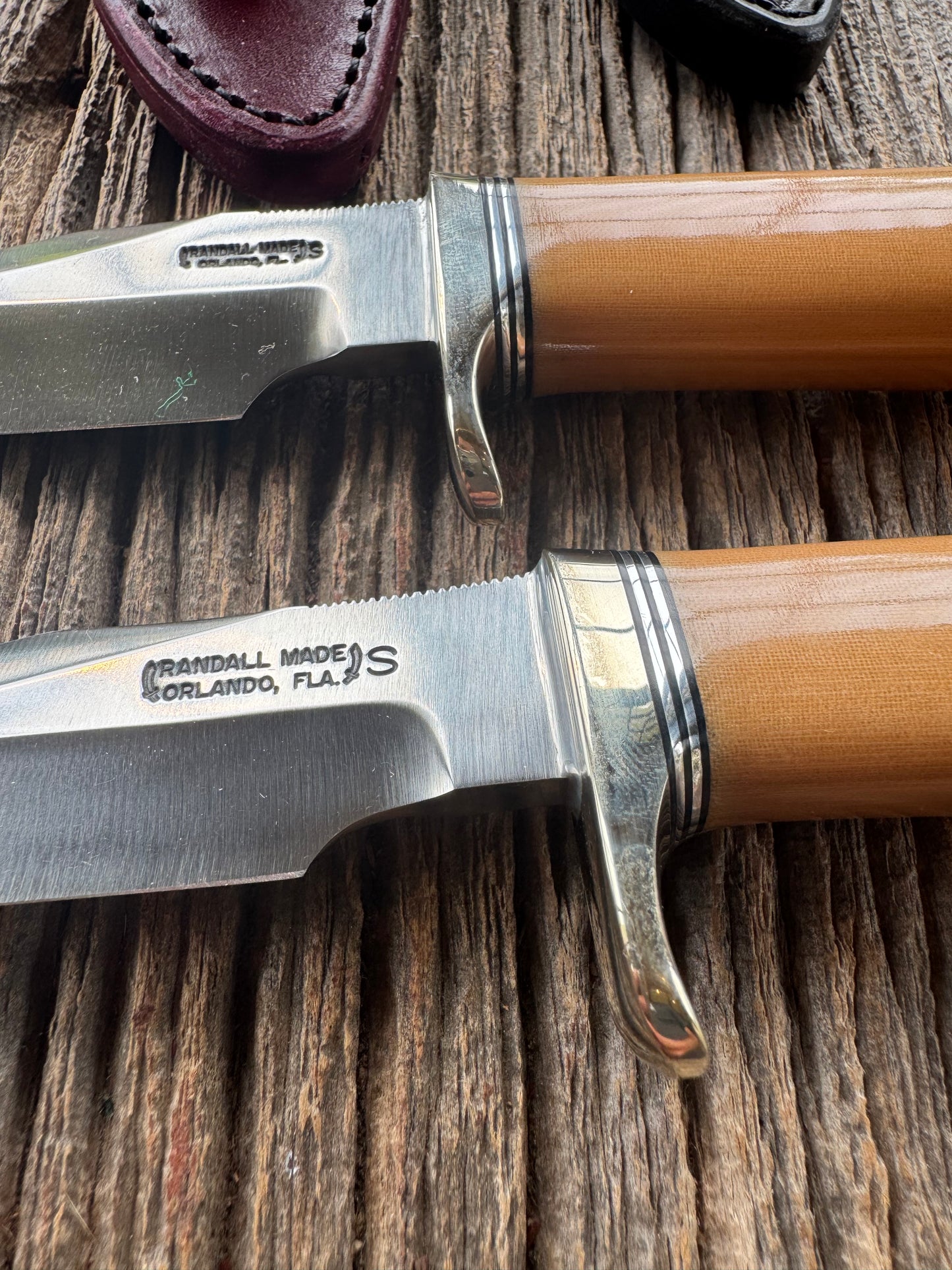 A pair of Randall Stanaback Specials in Bone Linen Micarta. A large and the small Stanaback with a 4 and a 4 1/2” Stainless steel Blade, Nickel Silver Single Hilt with Aluminum & Black Spacers. Nickel silver butt caps and a Lanyard. Special Edition
