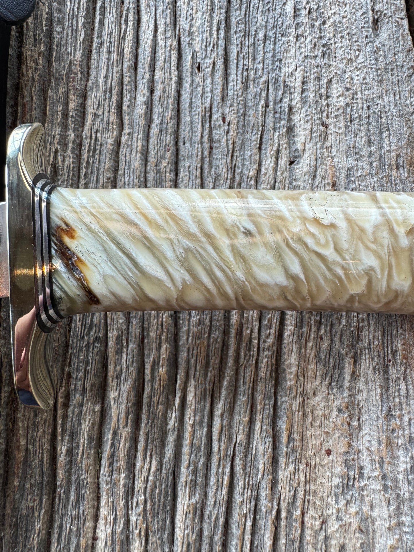 Randall Model 1-7 in Musk Ox. Nickel Silver Hilt and butt plate Black and Aluminum spacers, stainless steel blade.