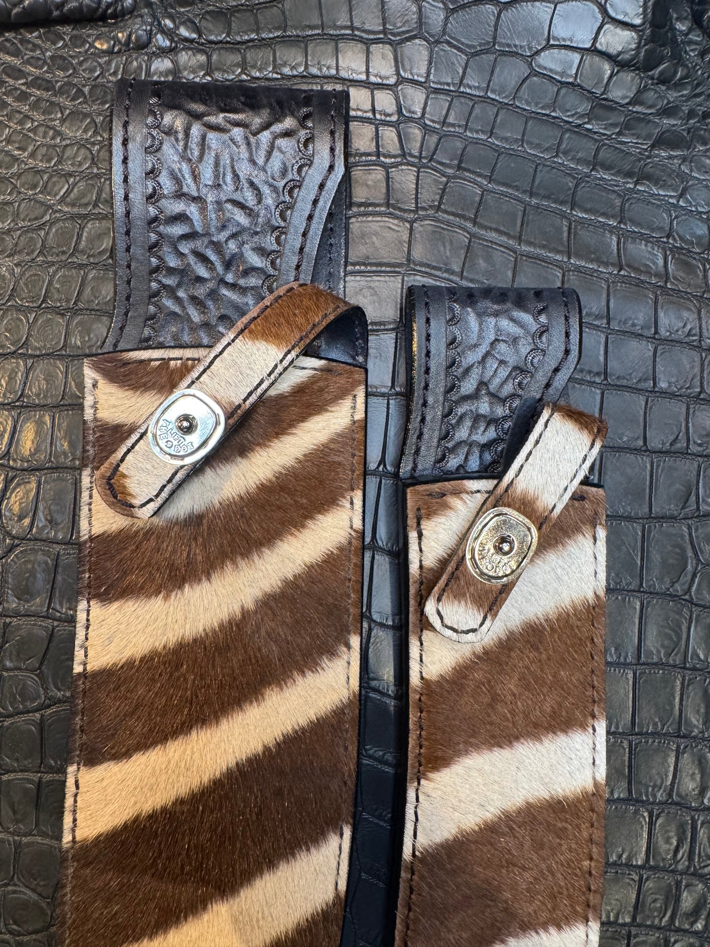 A pair of Randall Model 12-11 Large Sasquatch and Randall Model 12-8 Small Sasquatch Sheaths in Exotic Zebra by Treeman.