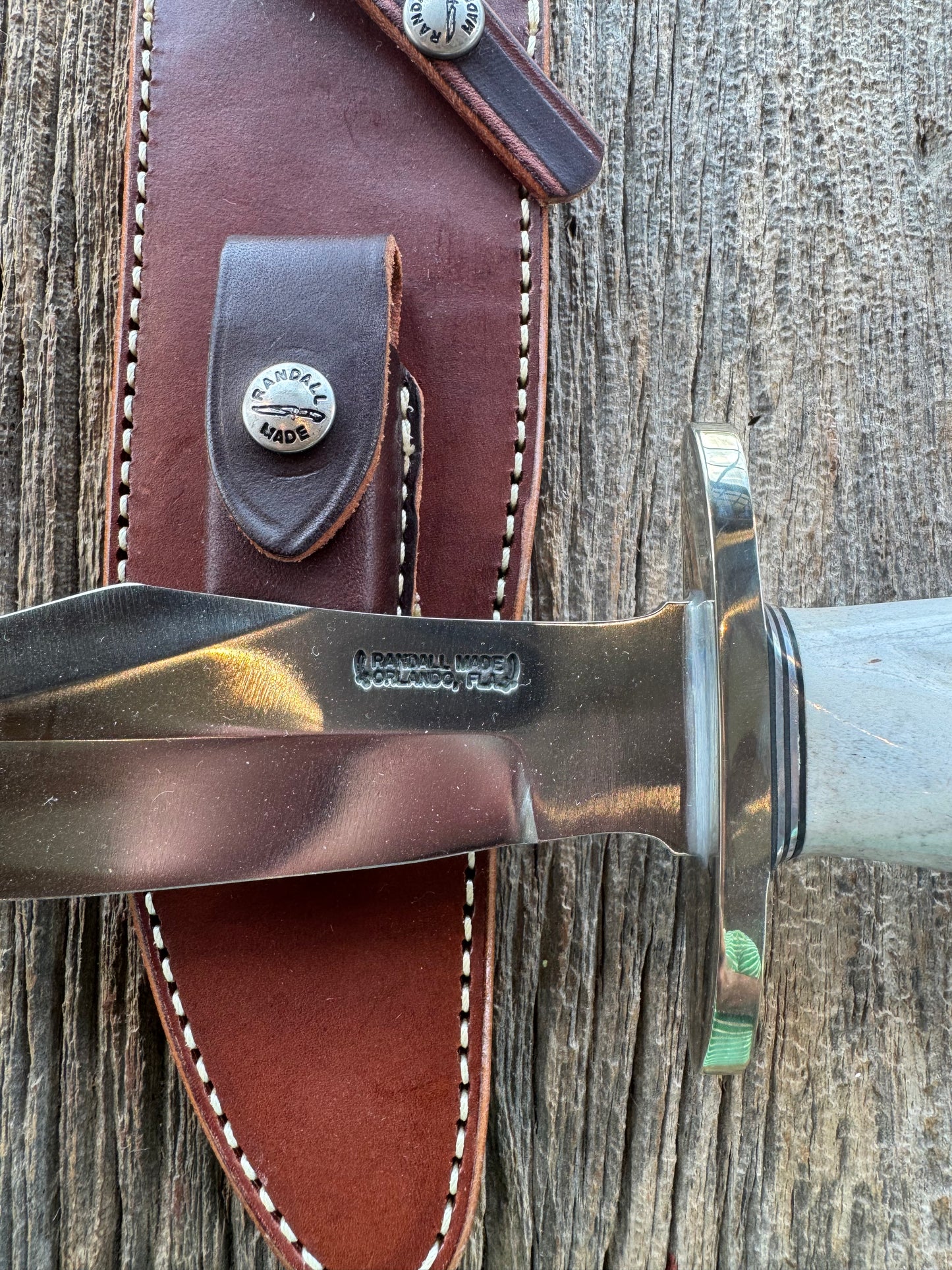 Randall Model 12-8 Big Bear in a gorgeous piece of Polished Crown Stag. Nickel Silver Hilt and a natural exposed end. Stainless,