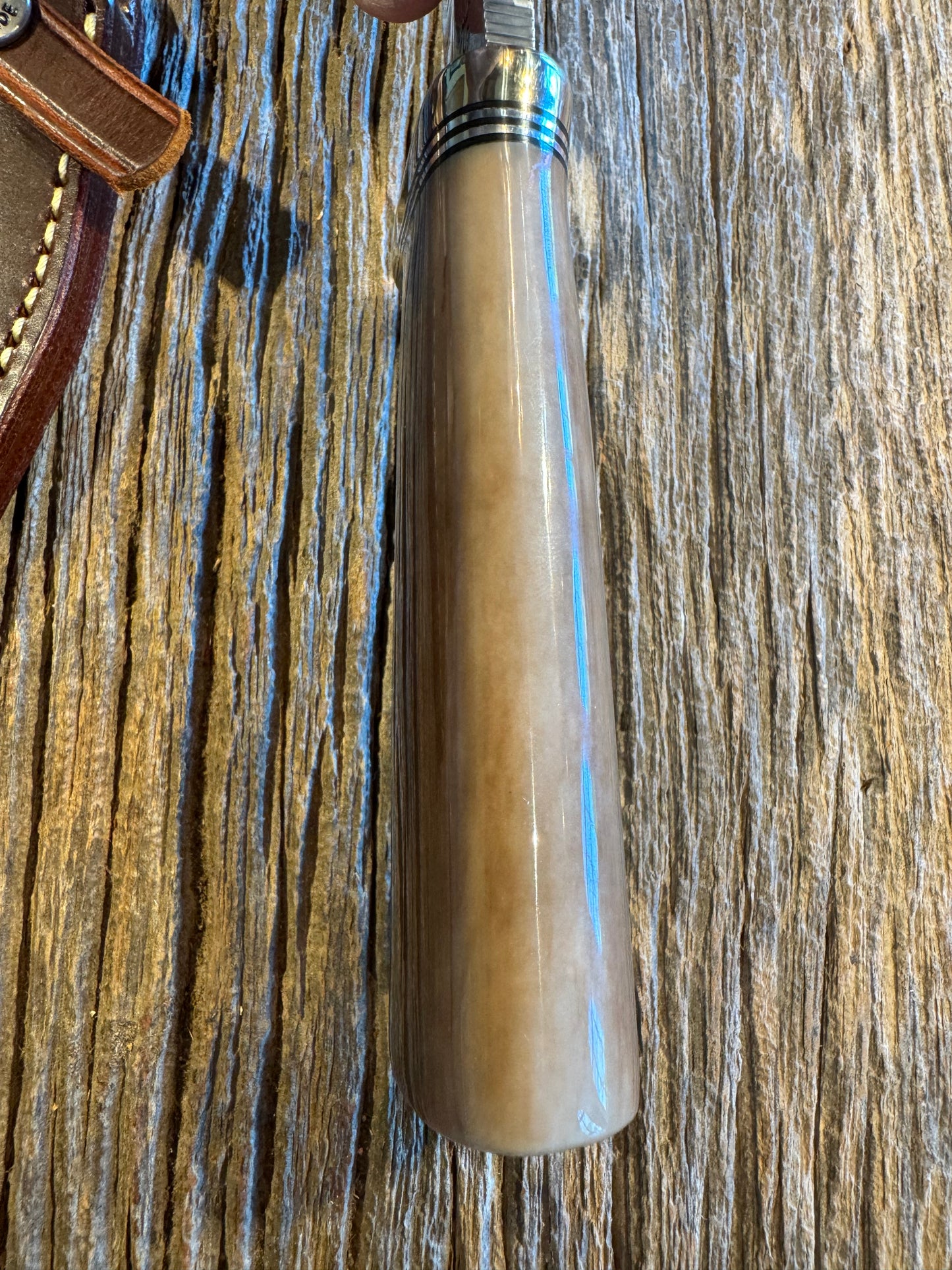 Randall Model 19-4 in Beautiful Fossil Walrus Ivory. Gorgeous colors and very rare to see a 19 in FWI. Nickel Silver Single Hilt and natural end, SS, and Flawless