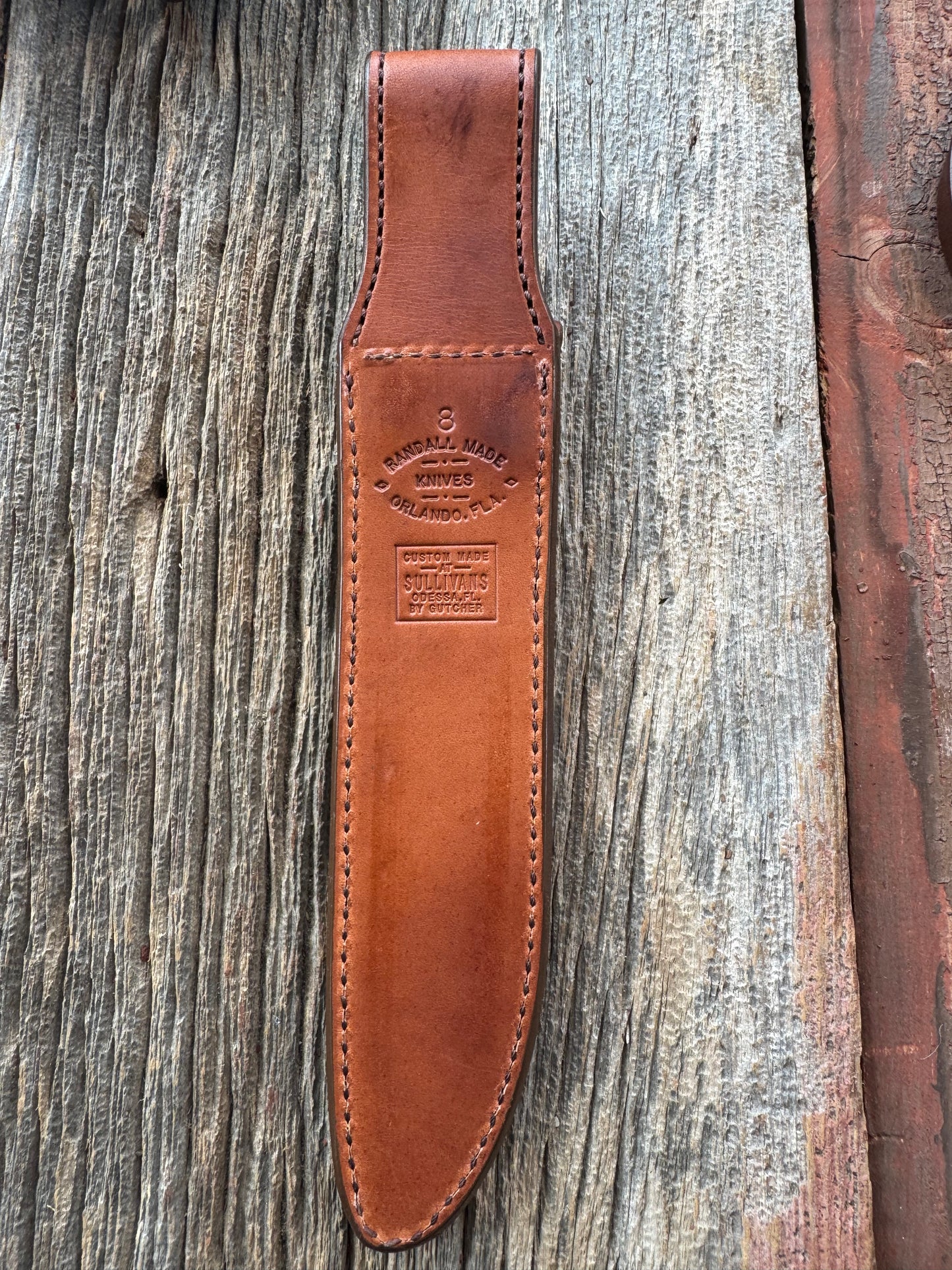 New Randall Model 1-8 or 2-8 Sheath in Exotic white Natural Croc with Anus and full leather belt loop. Custom Made at Sullivan’s by Gutcher with Randall stamp on back and snap.