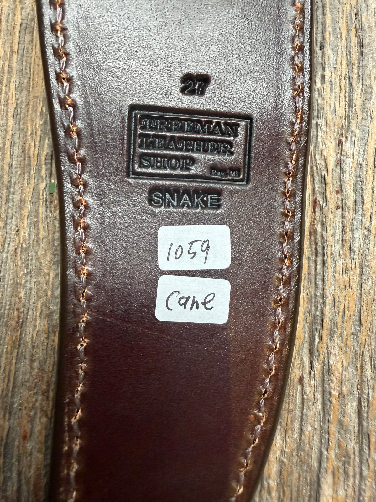 Randall Model 27 sheath with a Canebrake RattleSnake skin from Treeman Sheaths. Vibrant colors and along side Copperheads the hardest skin to source.