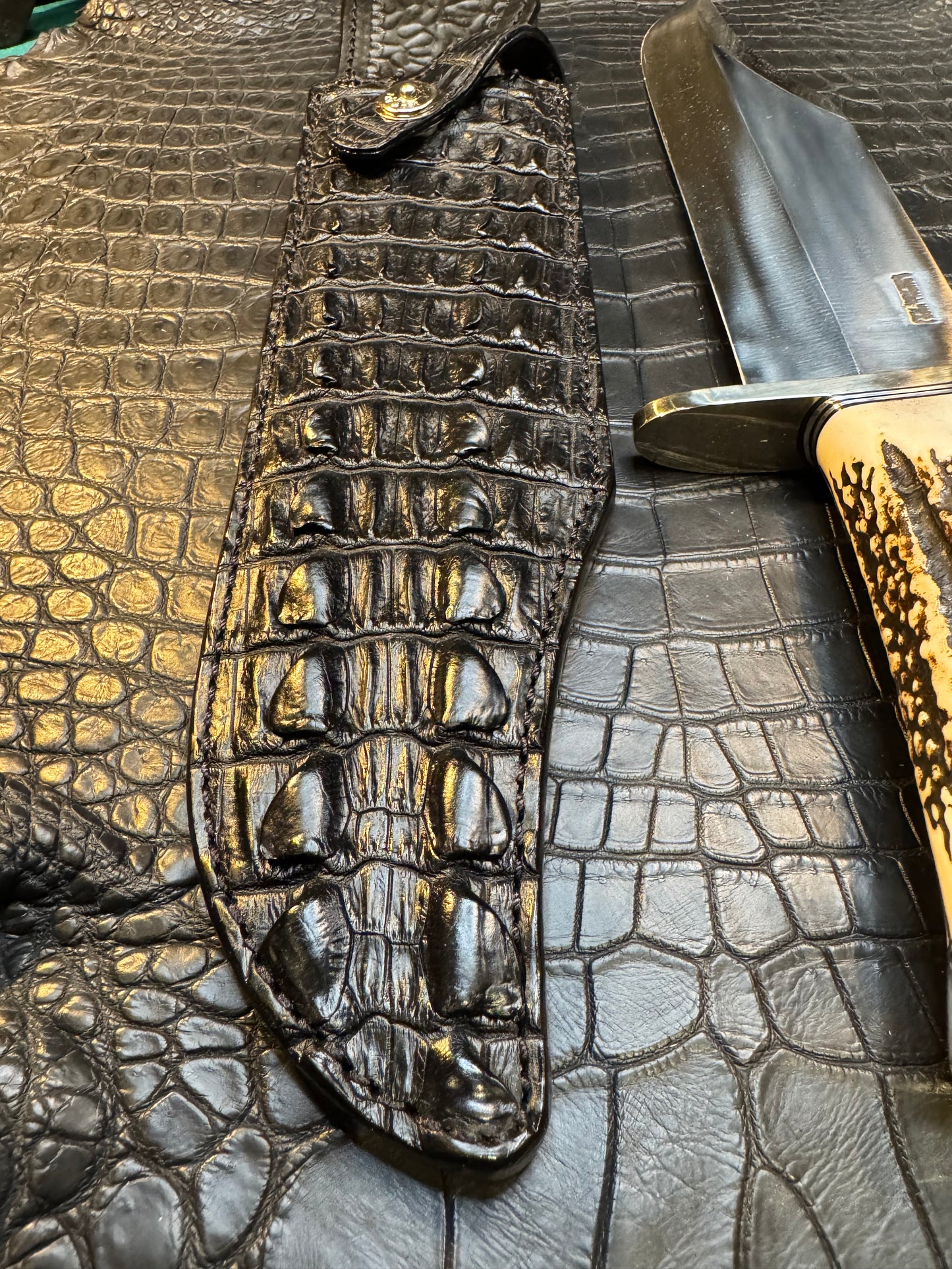 Randall Model Smithsonian “Smitty”Sheath in Exotic Australian Black Hornback ( center of the back) Crocodile skin from Treeman. Sheath only