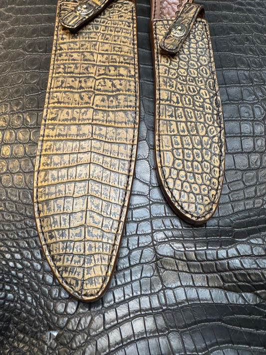 A pair of Randall Model 12-11 Large Sasquatch and Randall Model 12-8 Small Sasquatch Sheaths in Exotic Antique Brown Crocodile by Treeman.