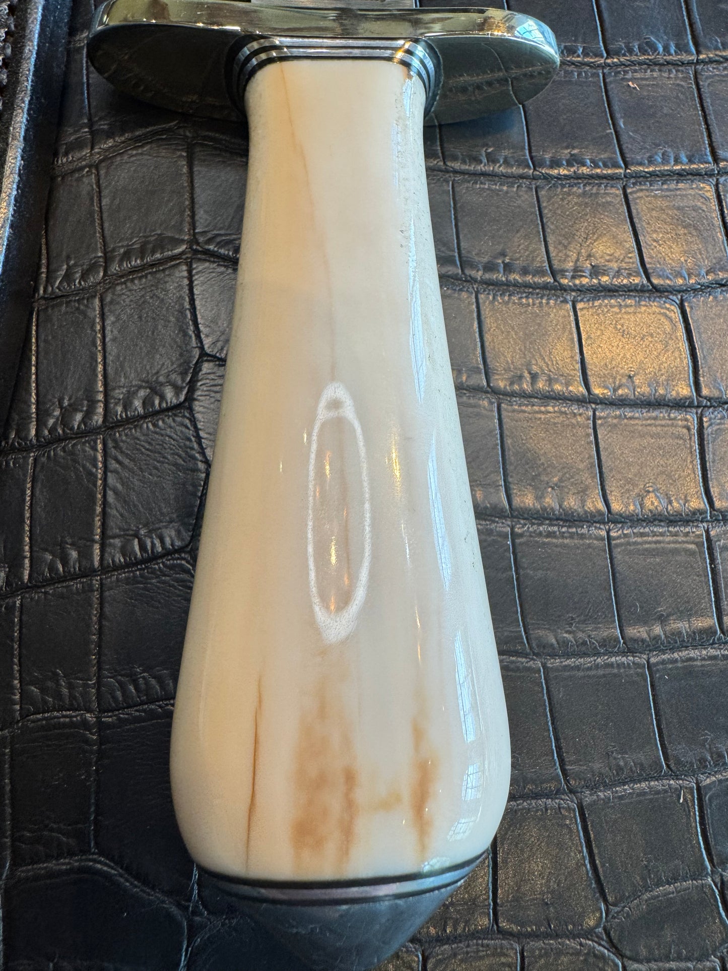 Randall Tom Clinton Dealer Special in a gorgeous piece of Creamy Fossil Walrus Ivory. Nickel Silver Hilt and Aluminum Flanged Butt cap.