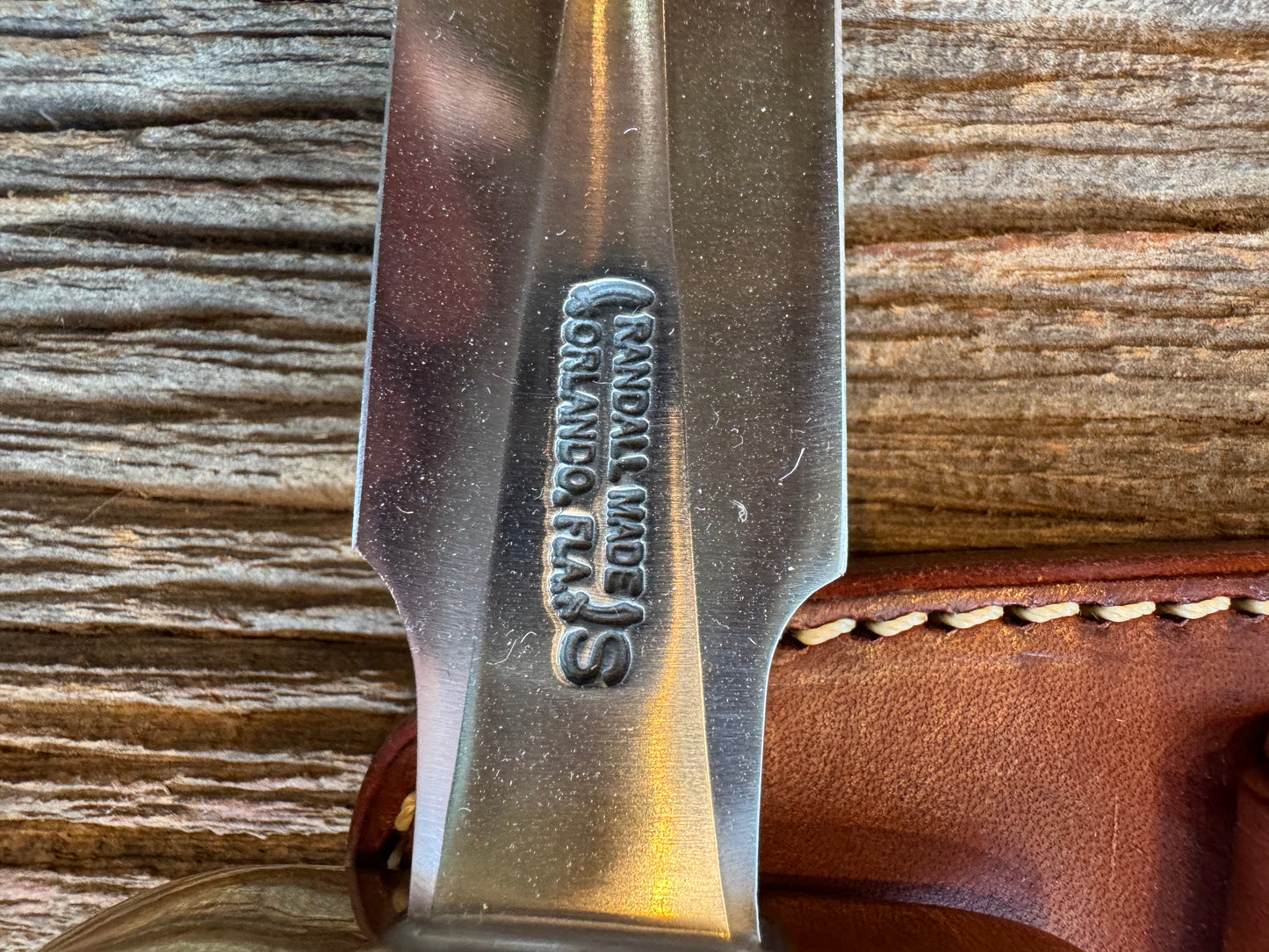 Randall Knife Model 2-6. Artifact Fossil Walrus in an Ice Ax Handle. Purchased from Rick Bowles, Stainless Steel.