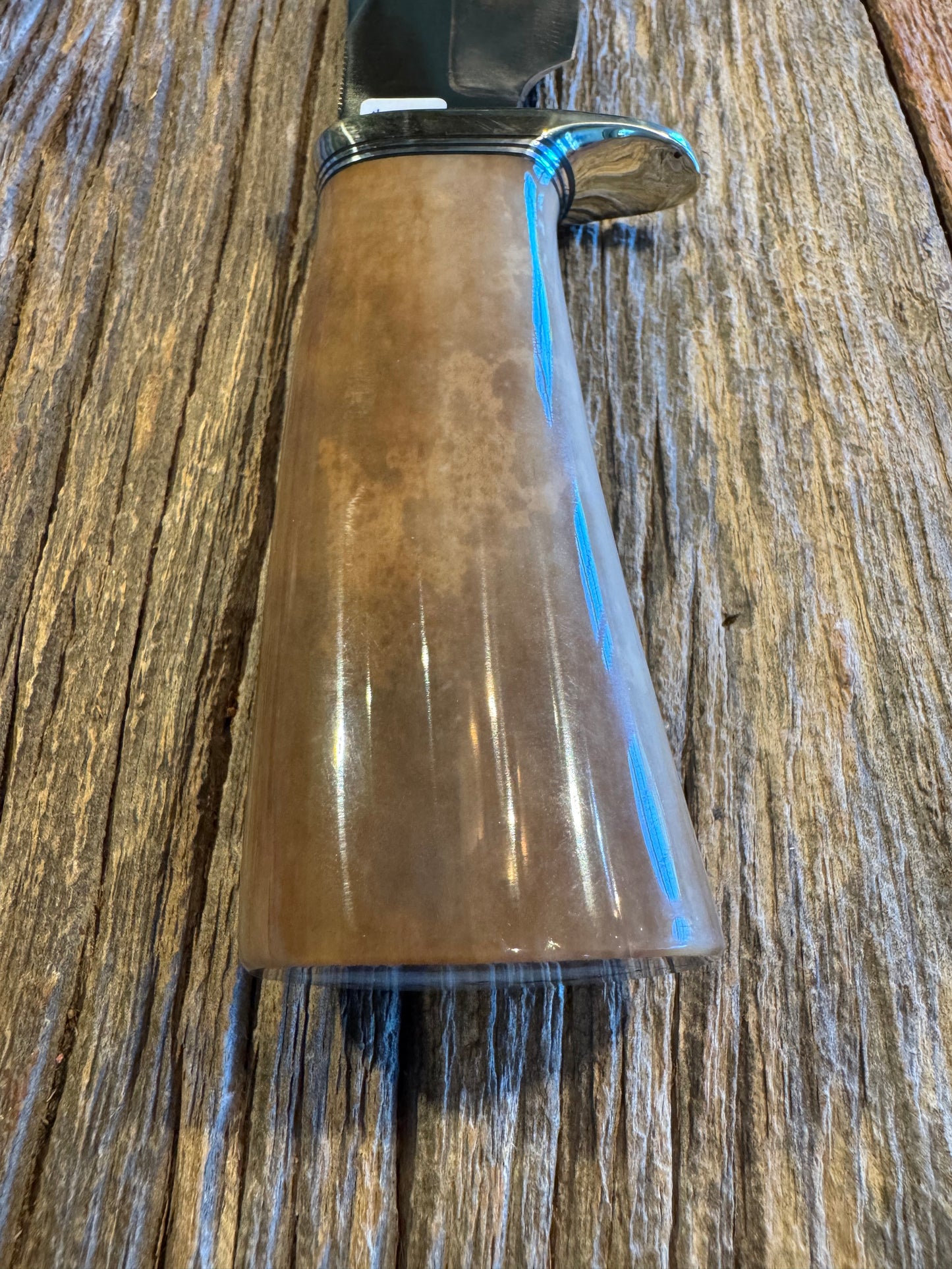 Randall Model 19-4 in Beautiful Fossil Walrus Ivory. Gorgeous colors and very rare to see a 19 in FWI. Nickel Silver Single Hilt and natural end, SS, and Flawless