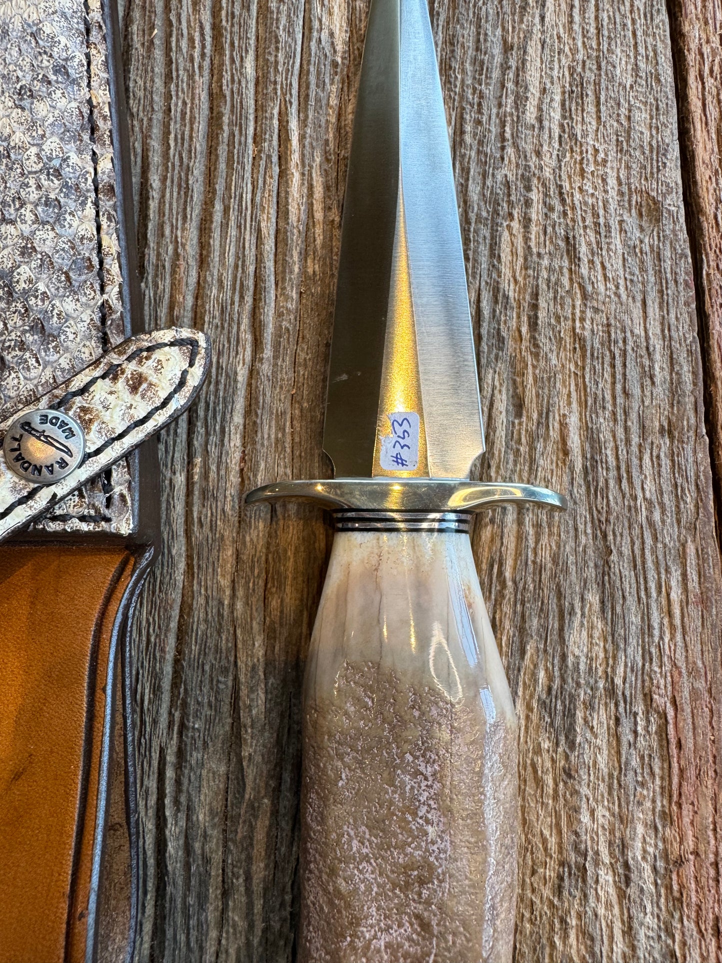 Randall Knife Model 13-6 Small Arkansas Toothpick Artifact. Fossil Walrus in an Ice Ax Handle. Included is a very rare Gutcher Rattlesnake sheath, Stainless Steel.