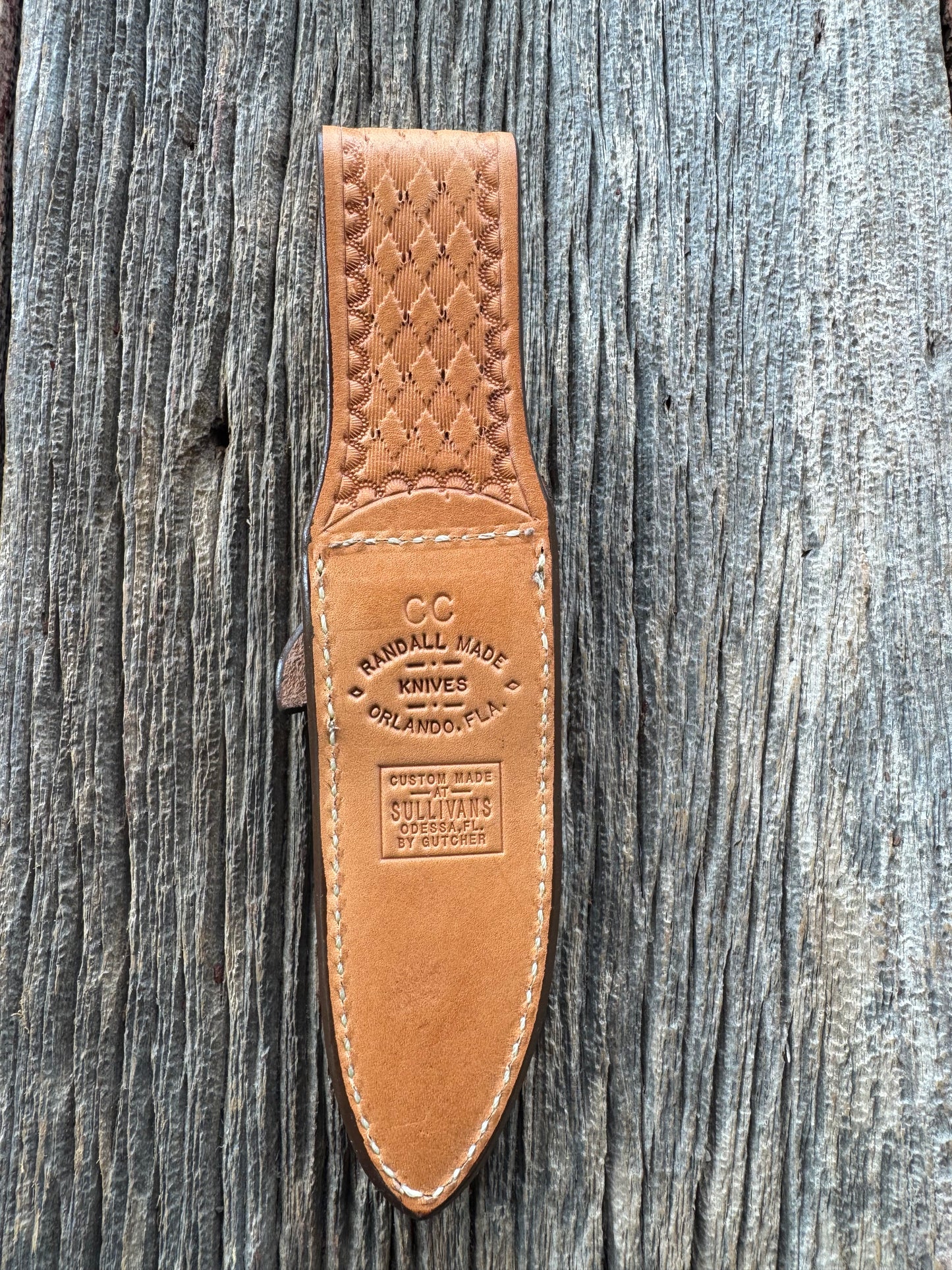 New Randall Model Combat Companion Sheath in Exotic Brown Natural Croc with full leather hand tooled belt loop. Randall snap and stamp on the back. Custom Made at Sullivan’s by Gutcher
