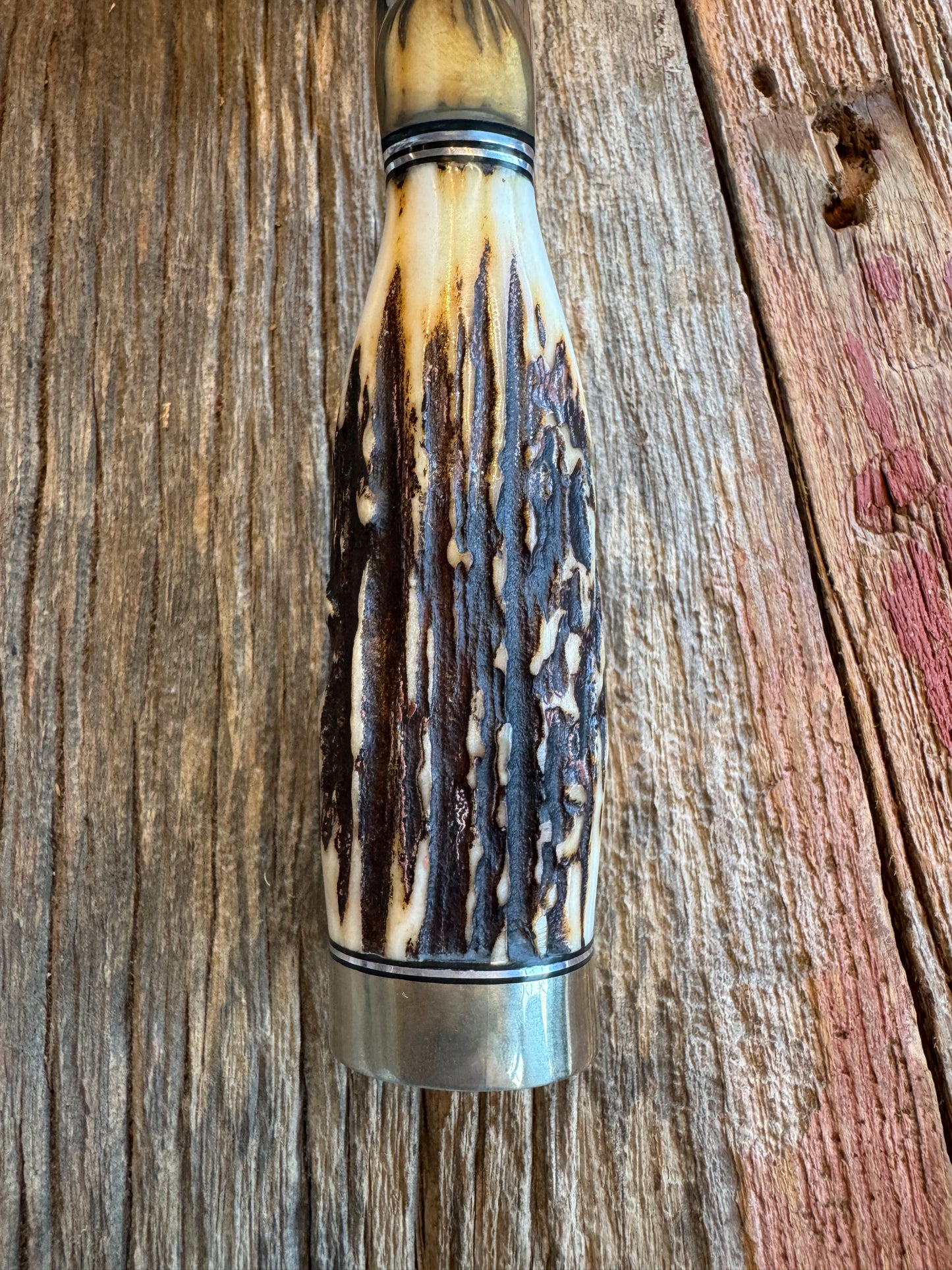 New in paper Randall Knife Model 12-8 “Big Bear” Large piece of Gnarly Popcorn Stag. Nickel silver hilt and butt cap. Stainless steel.