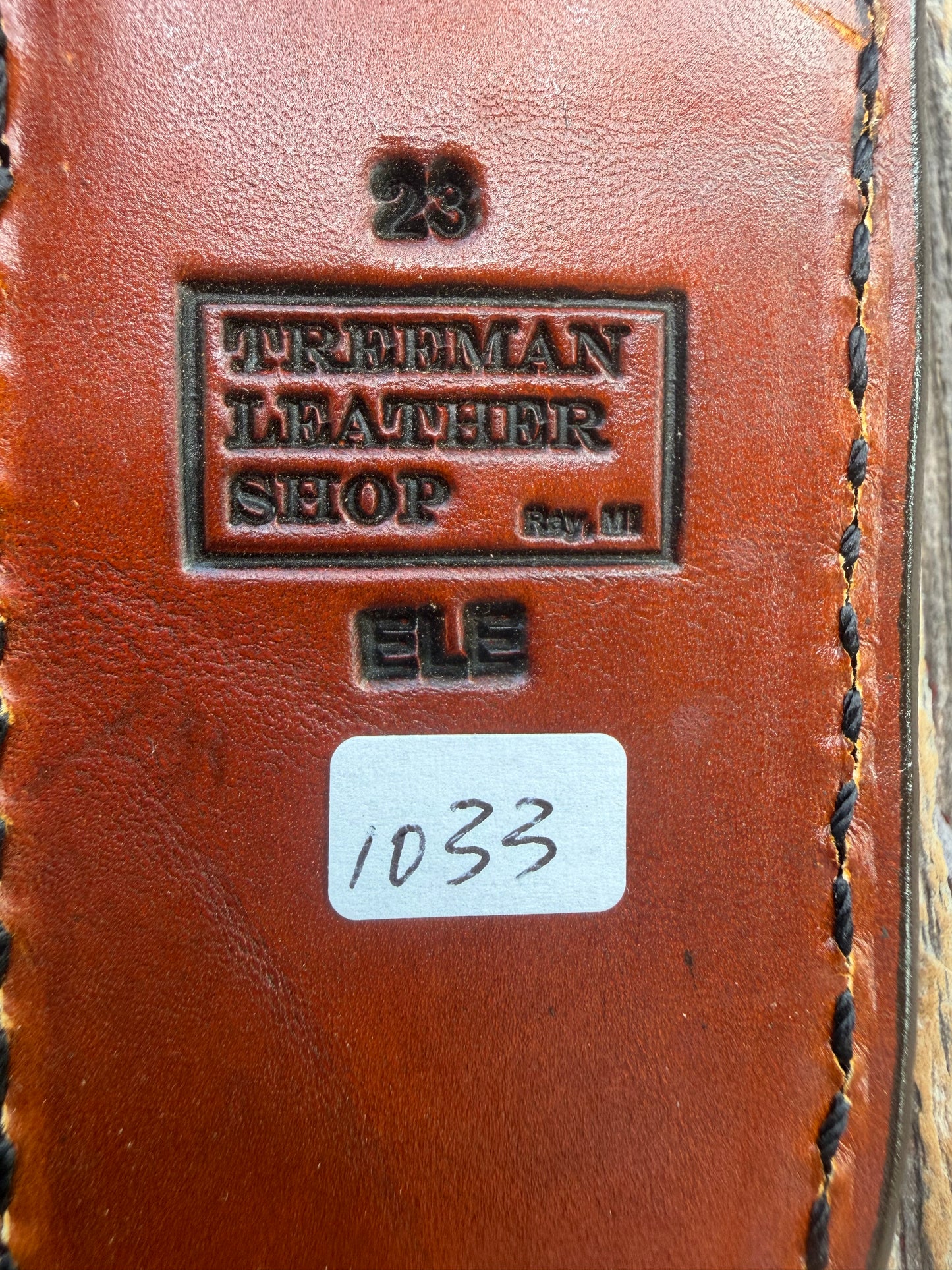 New Randall Model 23 Sheath in Exotic thick and textured Rust colored Elephant hide on brown leather from Treeman with a black Canteen snap. Hand tooled belt loop. Killer sheath.