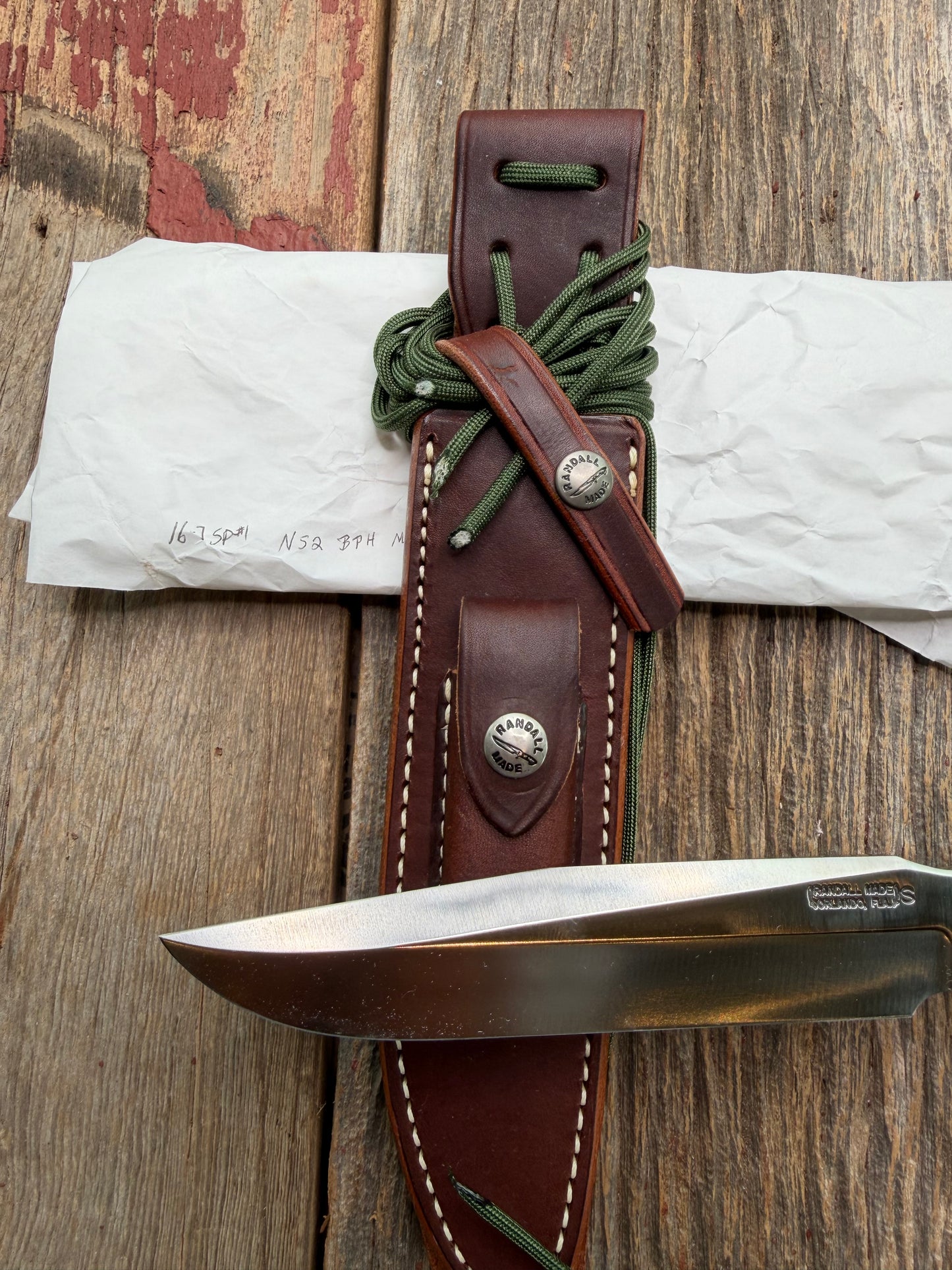 New in Paper Randall Model 16 SP#1 Special fighter with a Black Micarta handle. SS blade, Nickel silver hilt. Lanyard. Brown leather sheath.