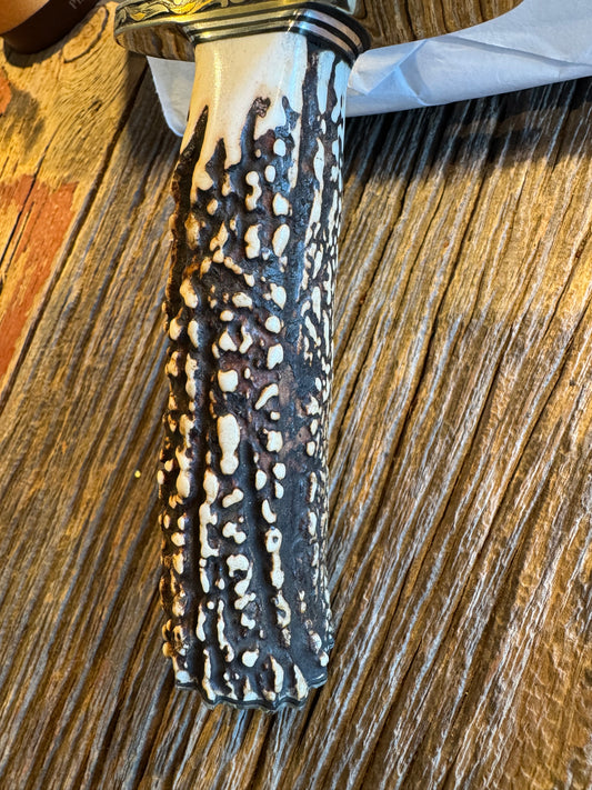 New in Paper Randall Model 12-8 Big Bear with a stunning piece of Popcorn Stag. Nickel Silver Hilt and Butt plate. Engraved head to toe with real gold and silver inlays by Jere Davidson.