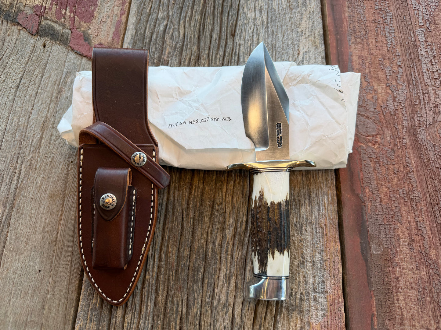 New in Paper Randall Model 19-5 with a Gnarly piece of Stag. Nickel silver Hilt and Aluminum crows beak Butt cap.