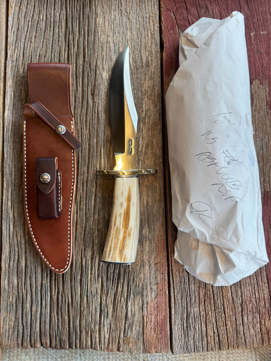 New in paper Randall Knife Model 12-8 Big Bear. Gorgeous piece of creamy Fossil Walrus Ivory. ( Creams, Blues, greens) Nickel silver hilt and butt plate. Stainless steel.