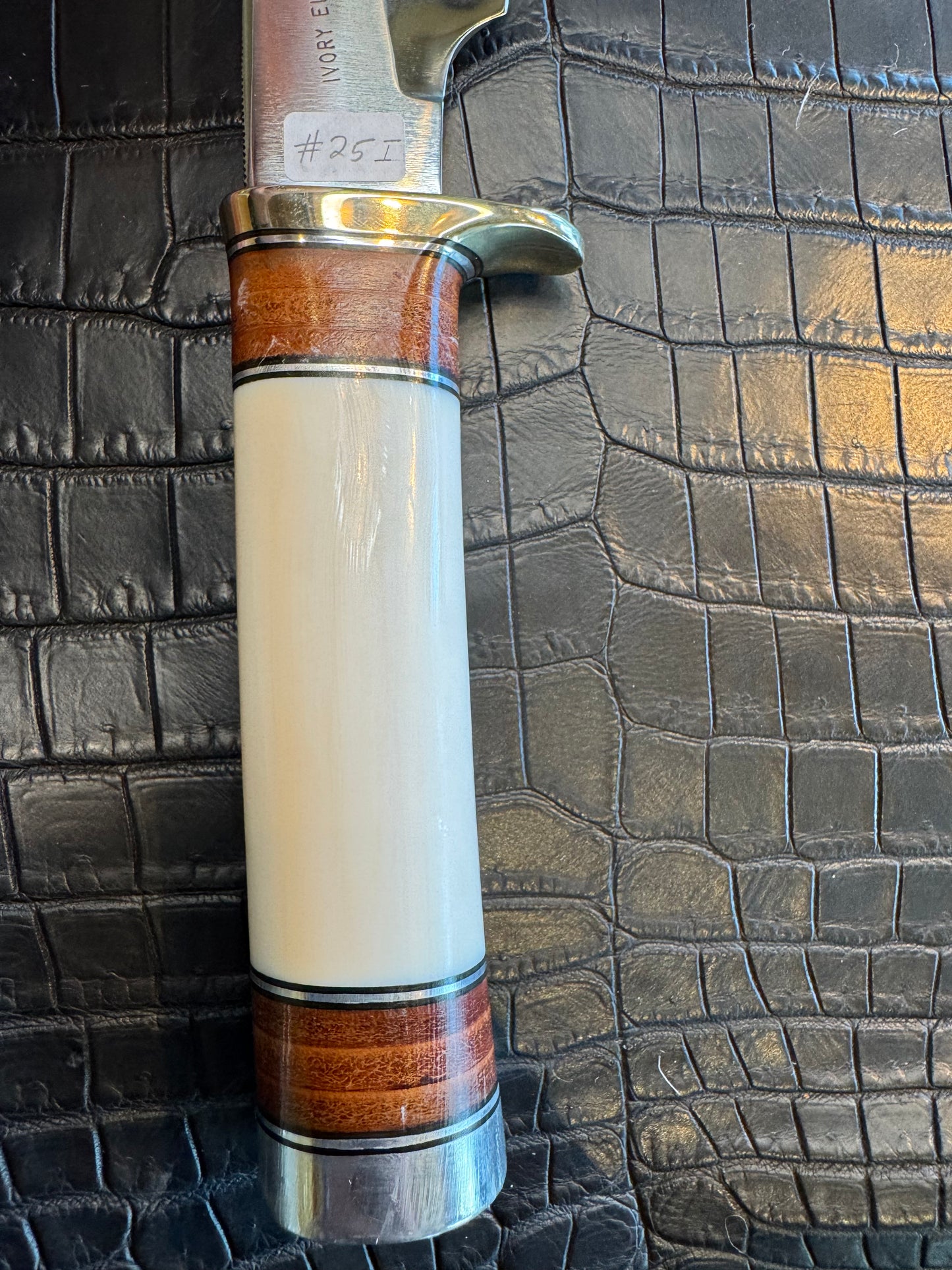Randall Model 25-6 in Elephant Ivory with stacked Leather, Nickel Silver Hilt and Aluminum Butt cap. Flawless.