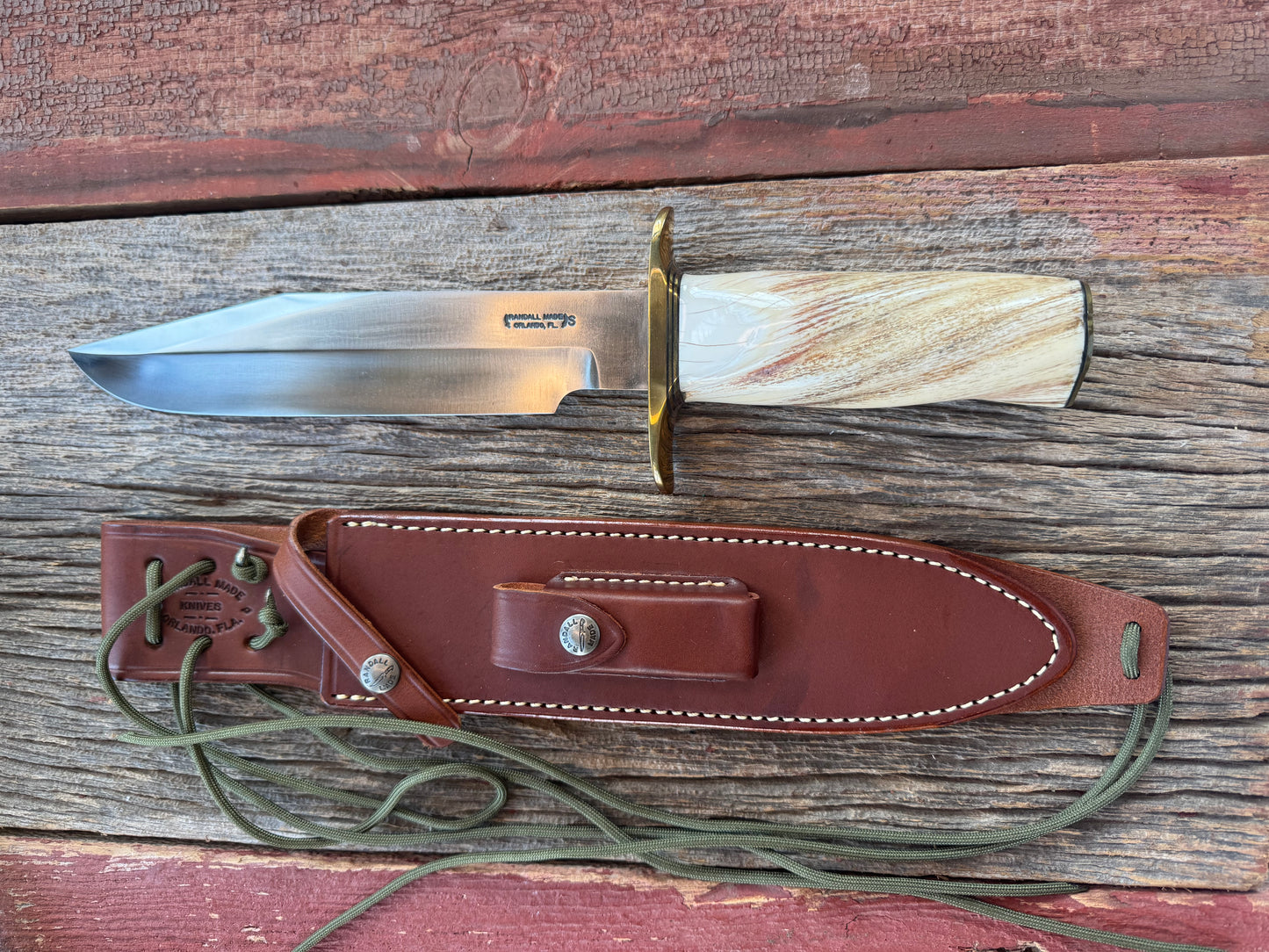 Rare Randall Model 12-9 in Beautiful Spiraled Narwal, Brass hilt and butt plate. Stainless steel, Stunning and rare. Really really fat handle.
