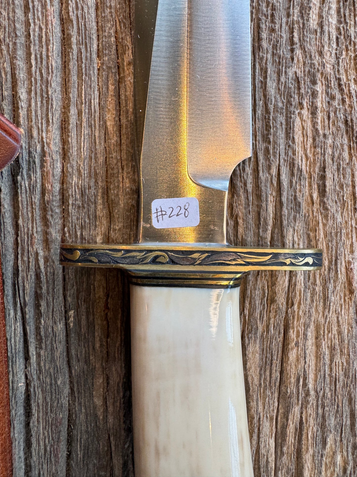 Randall Knife Model 1-7 FWI Handle. Jere Davidson engraved into Brass. Stainless Steel Blade. Stunning knife.