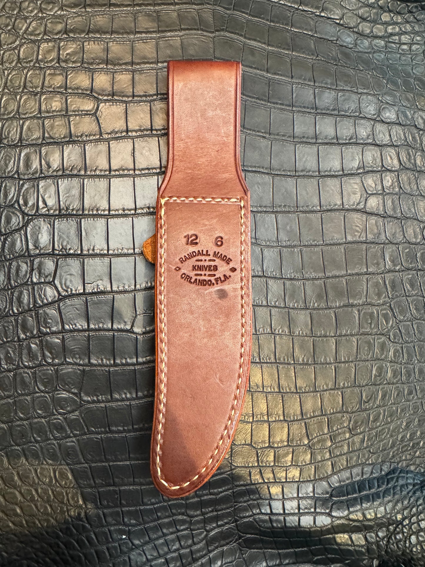 New unused Randall Model 12-6 “Little Bear” Sheath in Brown Leather made at Sullivans by Gutcher in Tampa Florida. Official sheath maker for Randall Knives.
