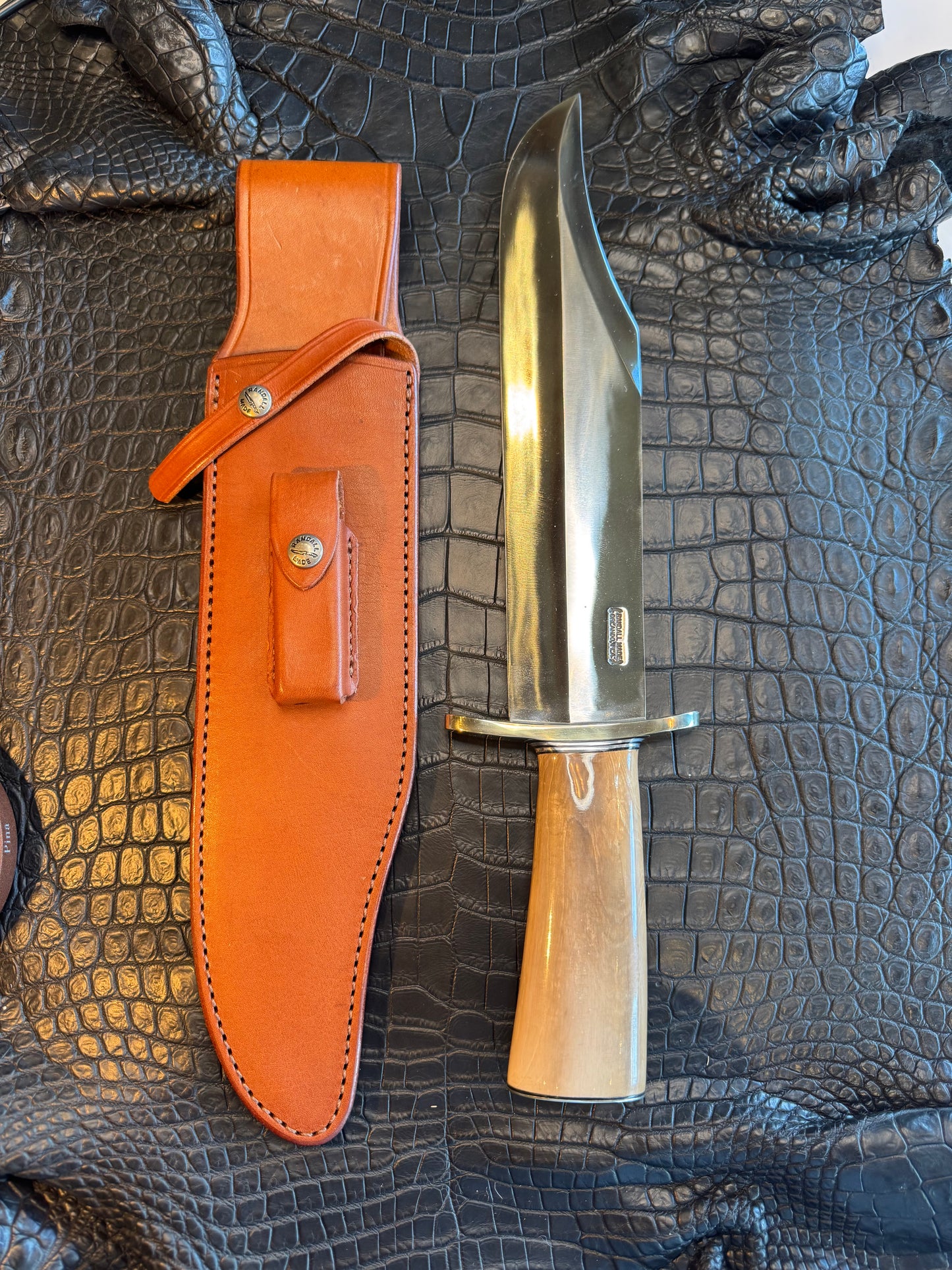 Randall Model 12-11 Smithsonian “Smitty” in a Huge piece of Green and Tan Fossil Walrus Ivory. Nickel Silver Hilt and Butt plate.