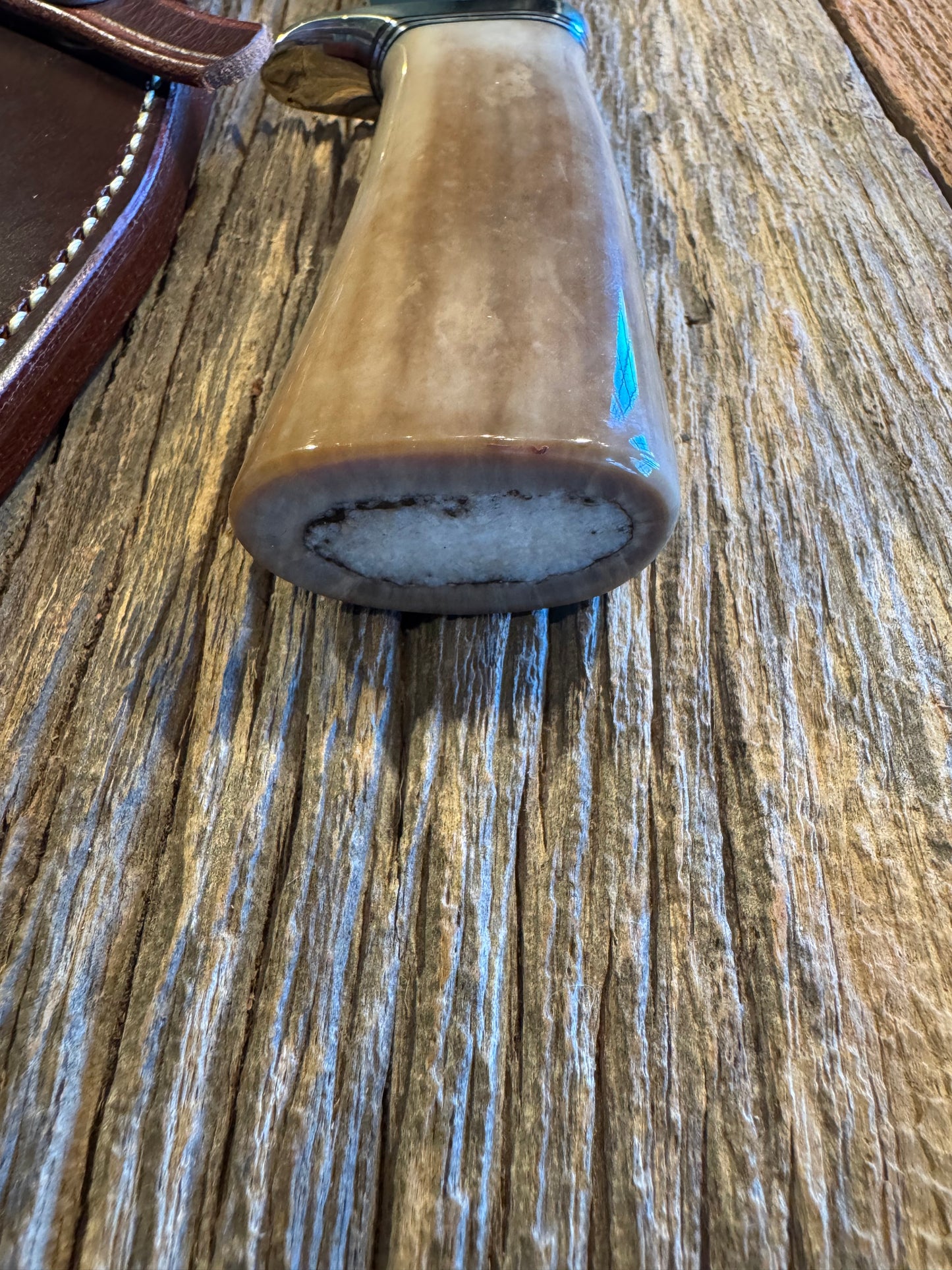 Randall Model 19-4 in Beautiful Fossil Walrus Ivory. Gorgeous colors and very rare to see a 19 in FWI. Nickel Silver Single Hilt and natural end, SS, and Flawless
