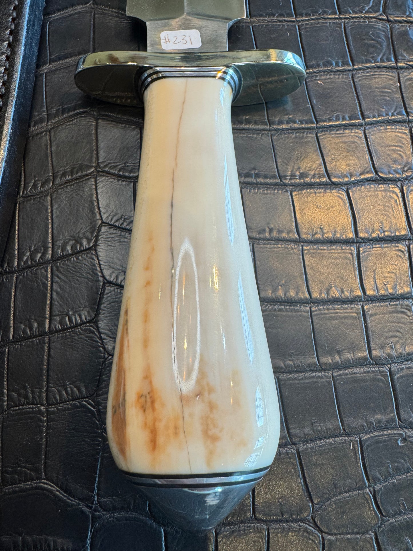 Randall Tom Clinton Dealer Special in a gorgeous piece of Creamy Fossil Walrus Ivory. Nickel Silver Hilt and Aluminum Flanged Butt cap.