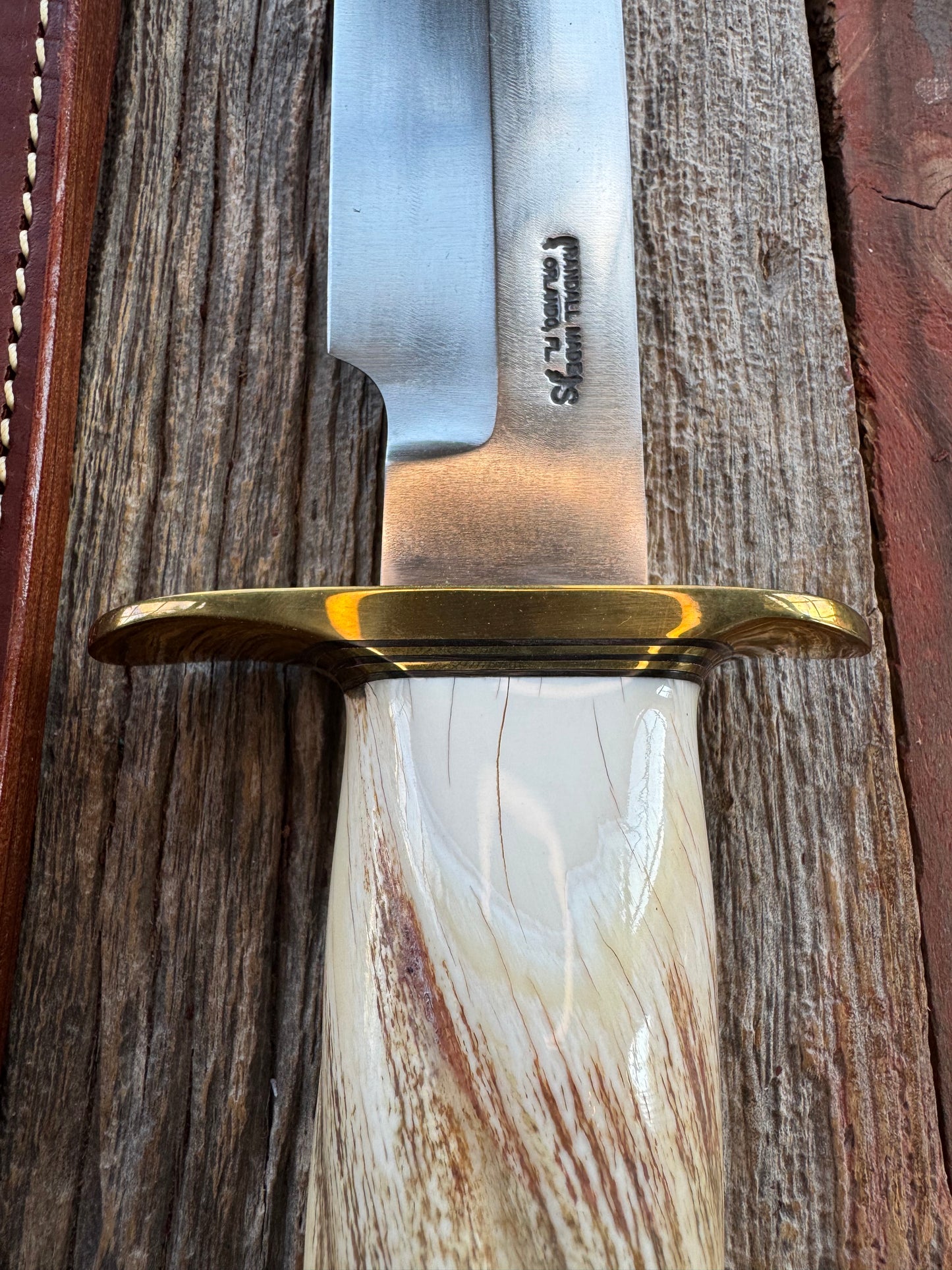 Rare Randall Model 12-9 in Beautiful Spiraled Narwal, Brass hilt and butt plate. Stainless steel, Stunning and rare. Really really fat handle.