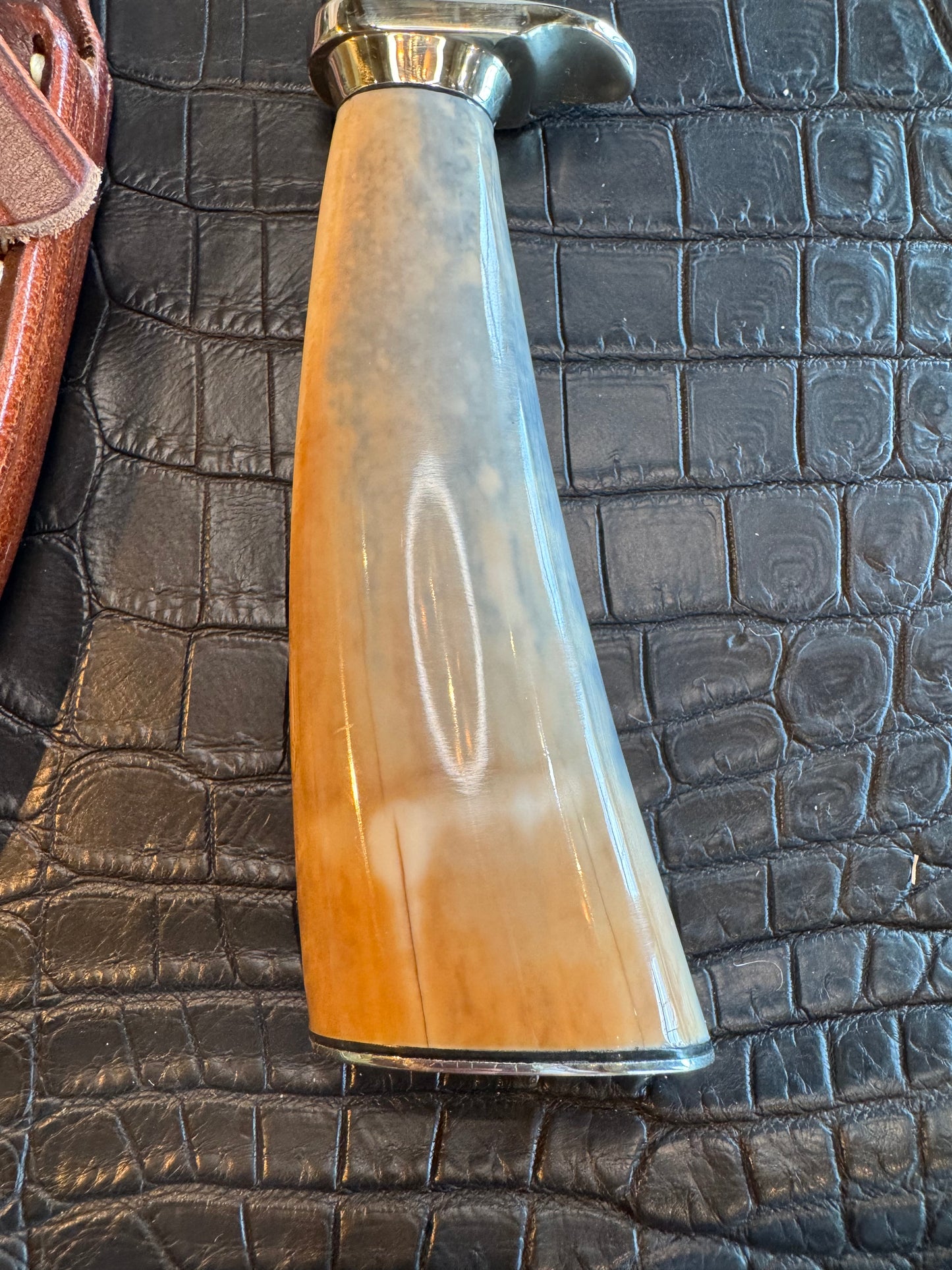 News in Paper Randall Model 8-4 in a gorgeous piece of Cream and Blue Fossil Walrus Ivory. Nickel Silver single hilt with a nickel Collar and butt cap.