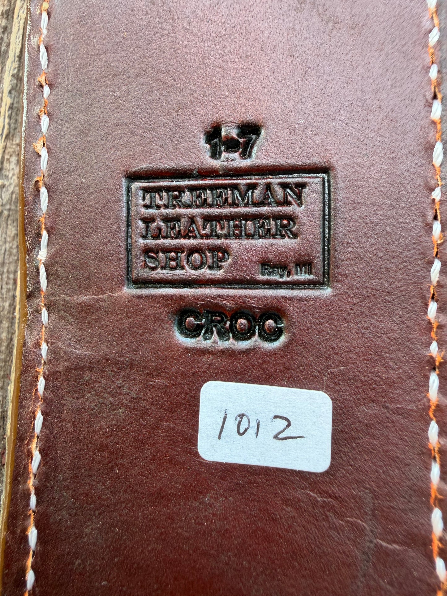 New Randall Model 1-7 Sheath in Exotic thick and textured Honey Crocodile skin on brown leather from Treeman with a silver Canteen snap. Hand tooled belt loop. Killer sheath.