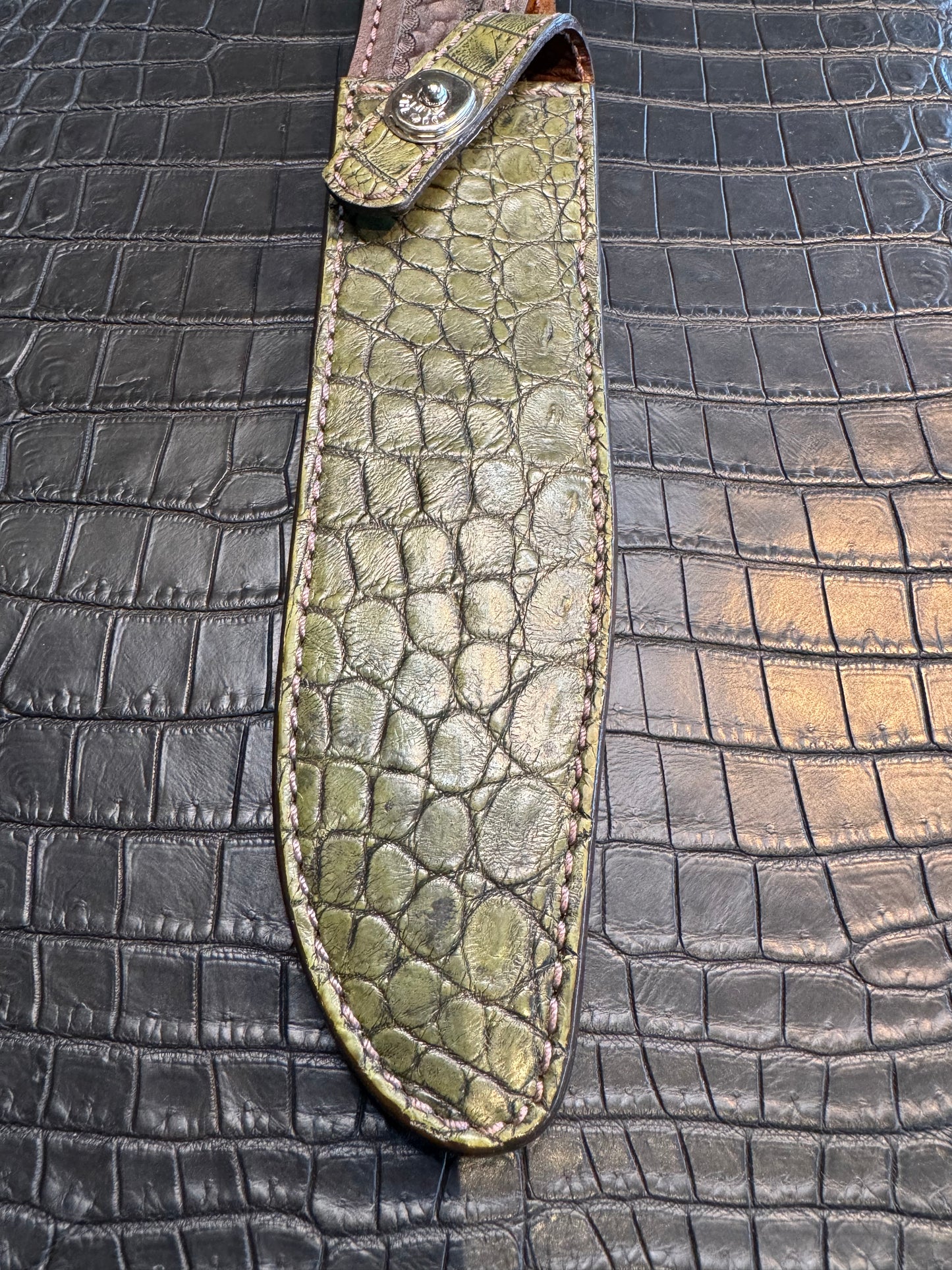 Randall Model 1-8 in Army Green Crocodile. Straight hilt, Canteen Snap, full brass stamping and stitching.
