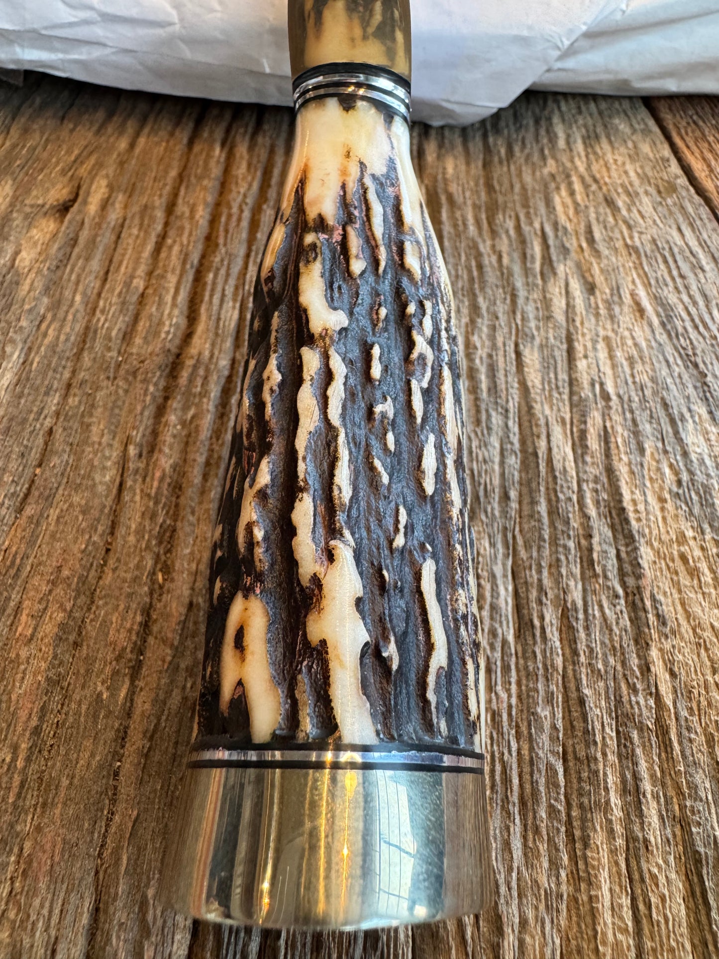 New in paper Randall Knife Model 12-8 “Big Bear” Large piece of Gnarly Popcorn Stag. Nickel silver hilt and butt cap. Stainless steel.