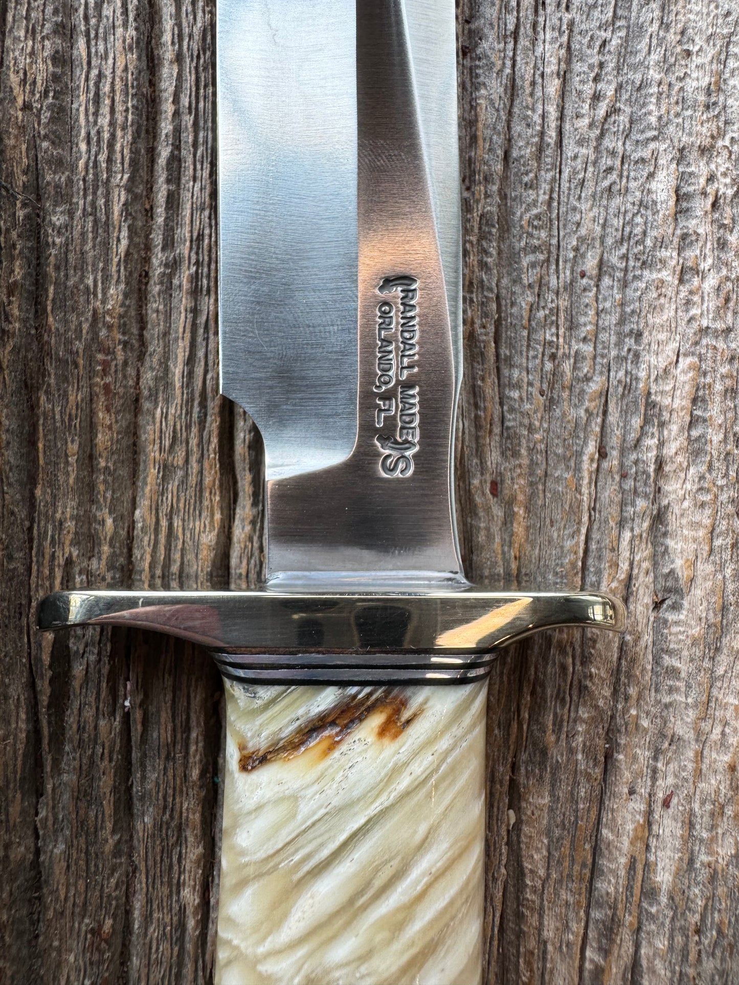 Randall Model 1-7 in Musk Ox. Nickel Silver Hilt and butt plate Black and Aluminum spacers, stainless steel blade.