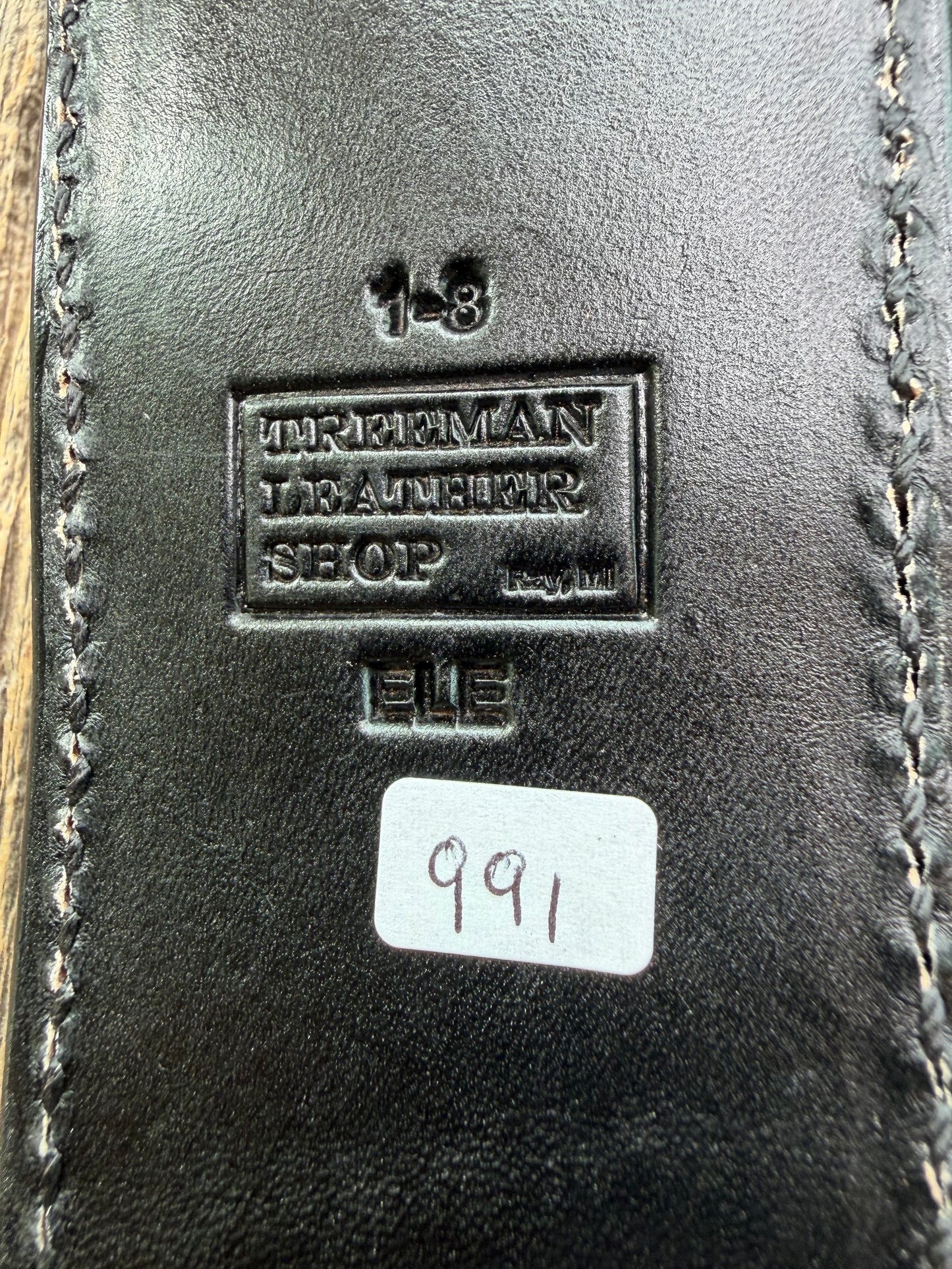 New Randall Model 1-8 Sheath in Exotic thick and textured Grey Elephant Hide on black leather from Treeman with a black Canteen snap. Hand tooled belt loop. Killer sheath.